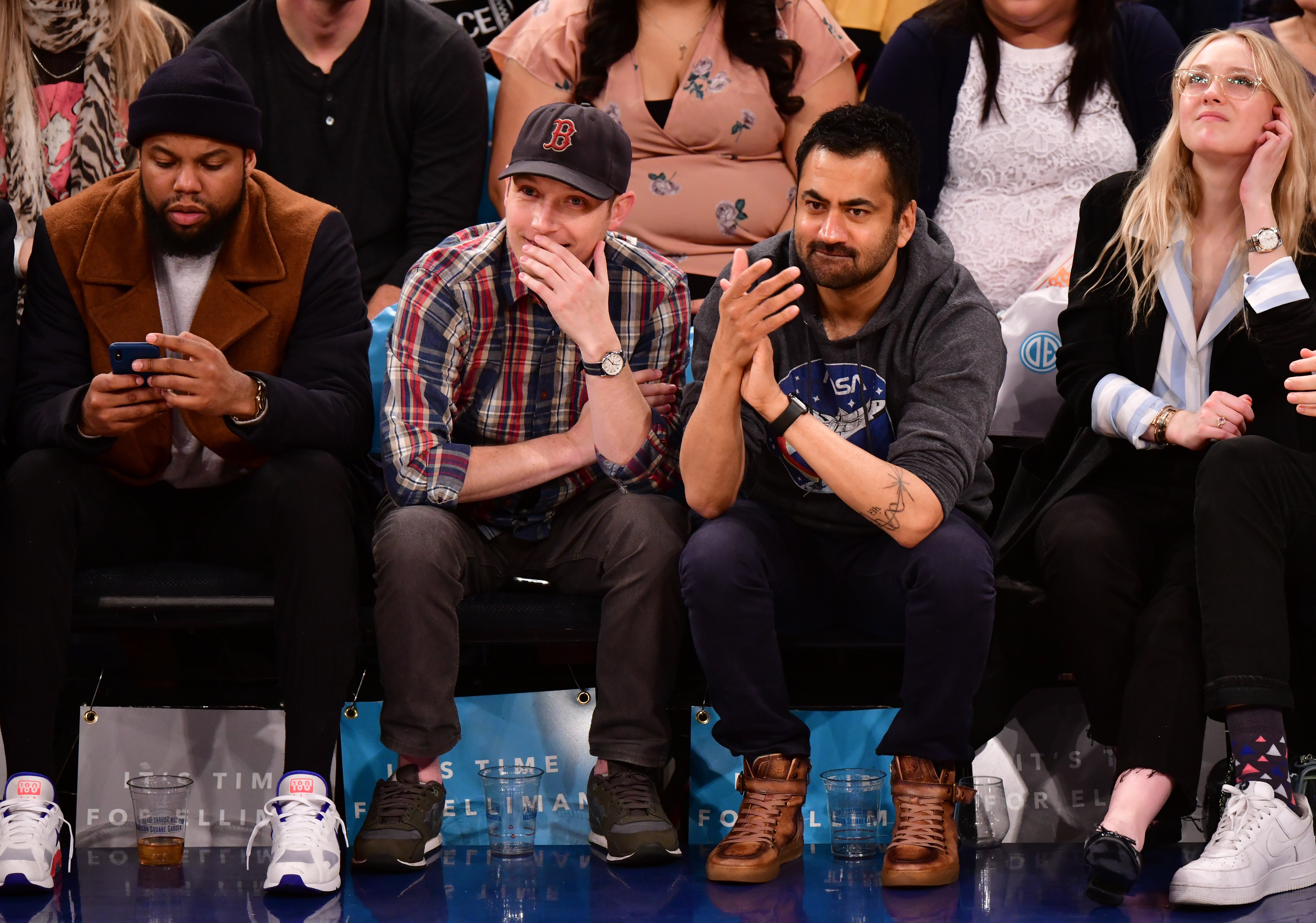 Kal Penn and his rumored fiancé Josh are on the sidelines watching the York Knicks Vs. Detroit Pistons basketball game on March 31, 2018, in New York City. | Source: Getty Images