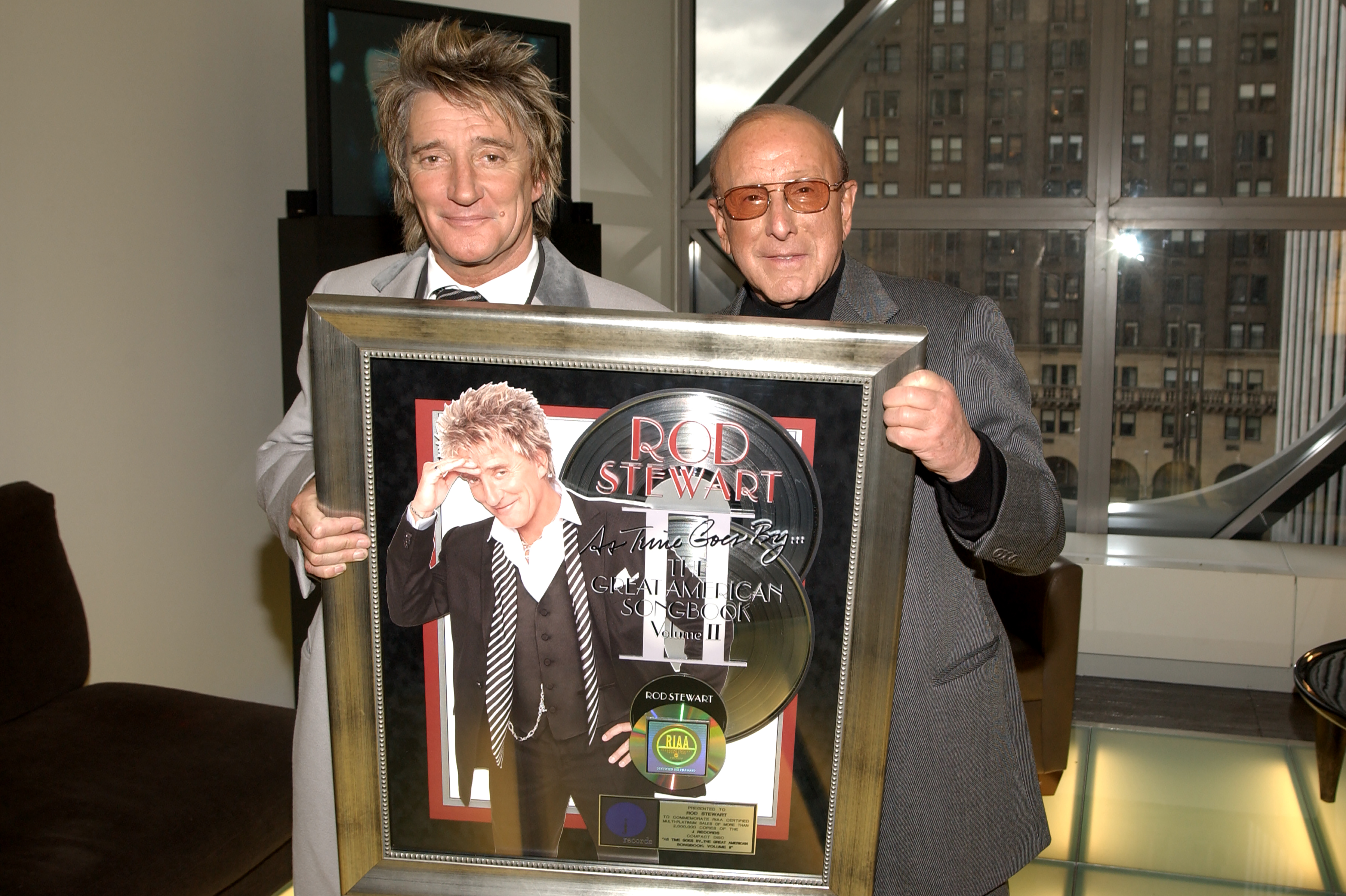 Clive Davis is pictured with Rod Stewart, one of the many artists whose career he helped shape over the course of his remarkable career. | Source: Getty Images