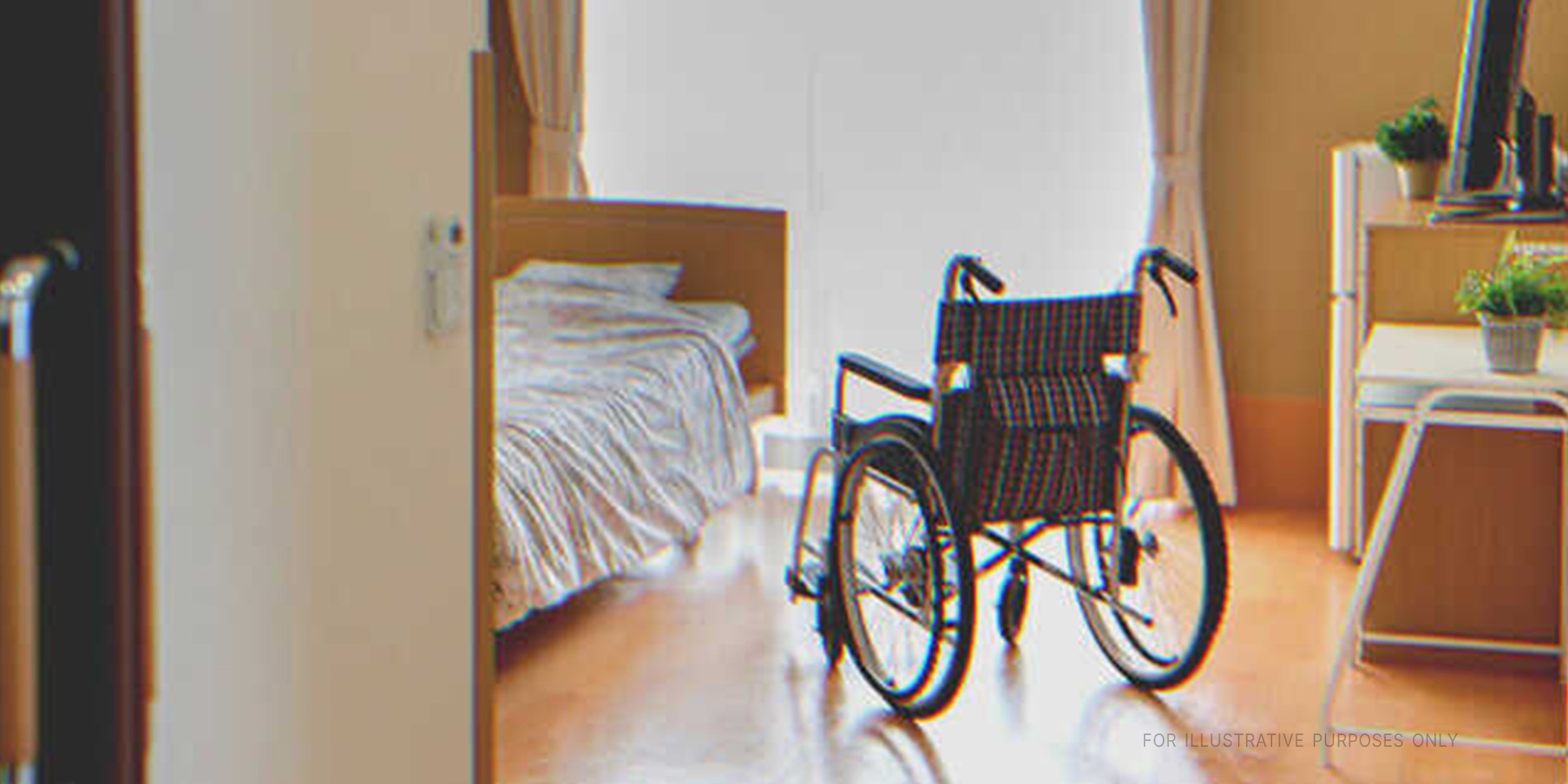 Empty wheelchair in a nursing home. | Shutterstock