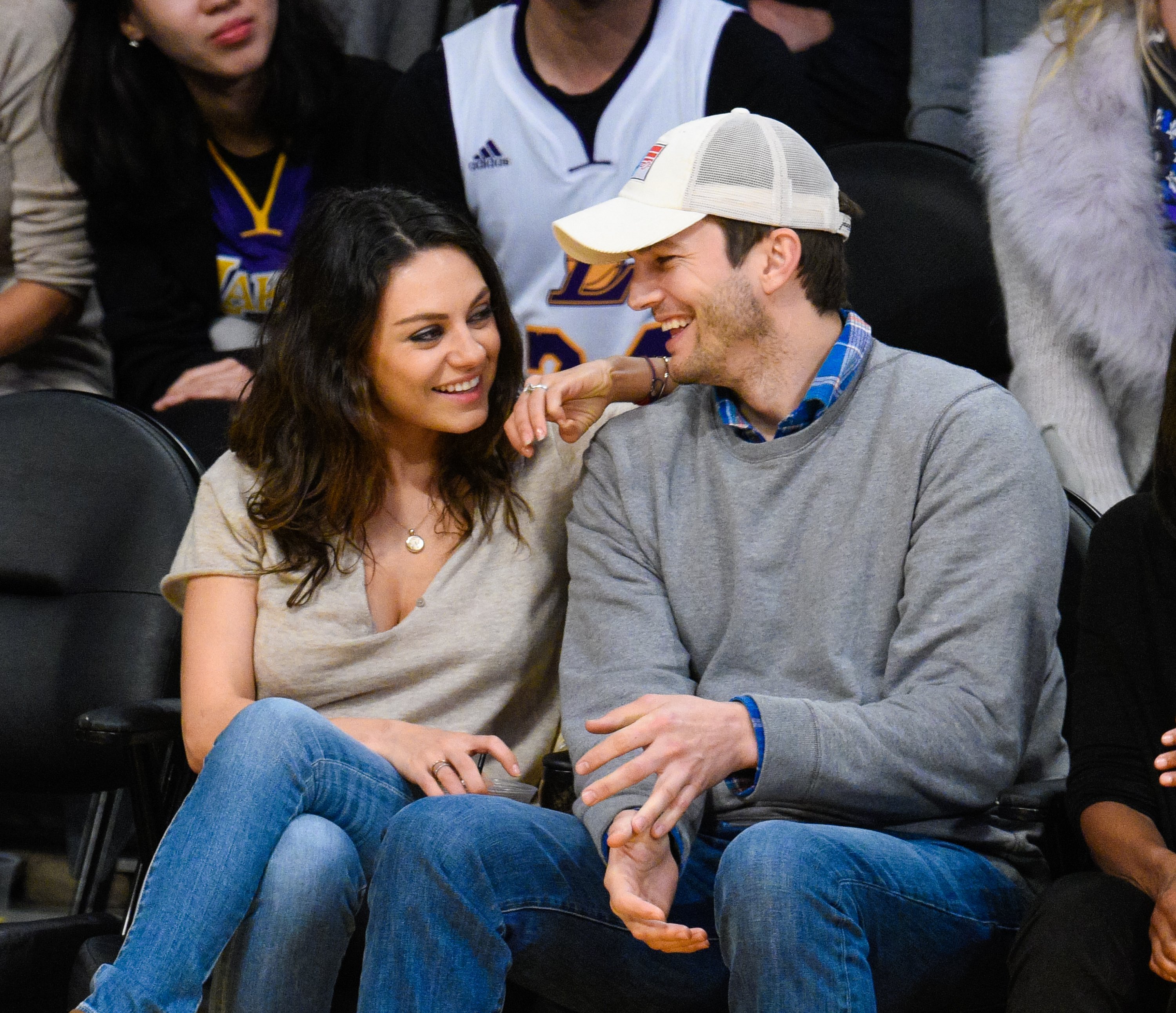 Mila Kunis and Ashton Kutcher in Los Angeles in 2014 | Source: Getty Images