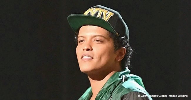 Bruno Mars shows off healthy physique with a growing belly enjoying vacation with longtime girlfriend