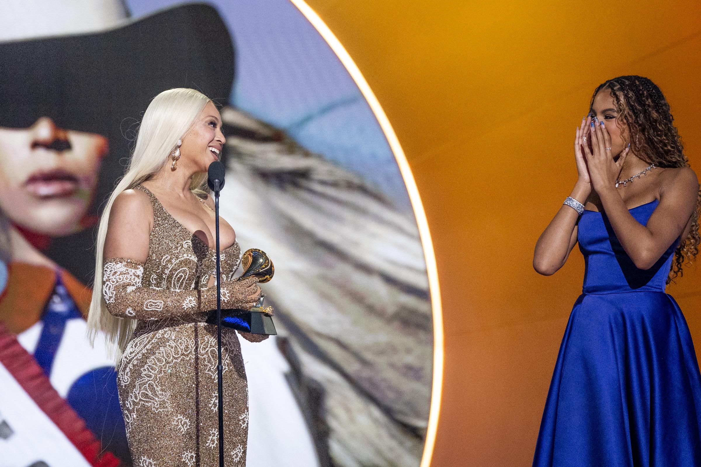 Beyoncé accepts the Album of the Year award for "COWBOY CARTER" onstage with Blue Ivy Carter at the 67th annual GRAMMY Awards on February 02, 2025, in Los Angeles, California. | Source: Getty Images