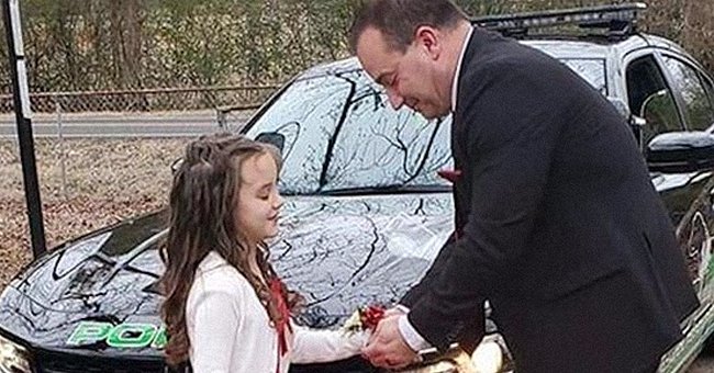 Officer takes Avey Cox to the school dance after her dad's death. | Source: twitter.com/nbcchicago