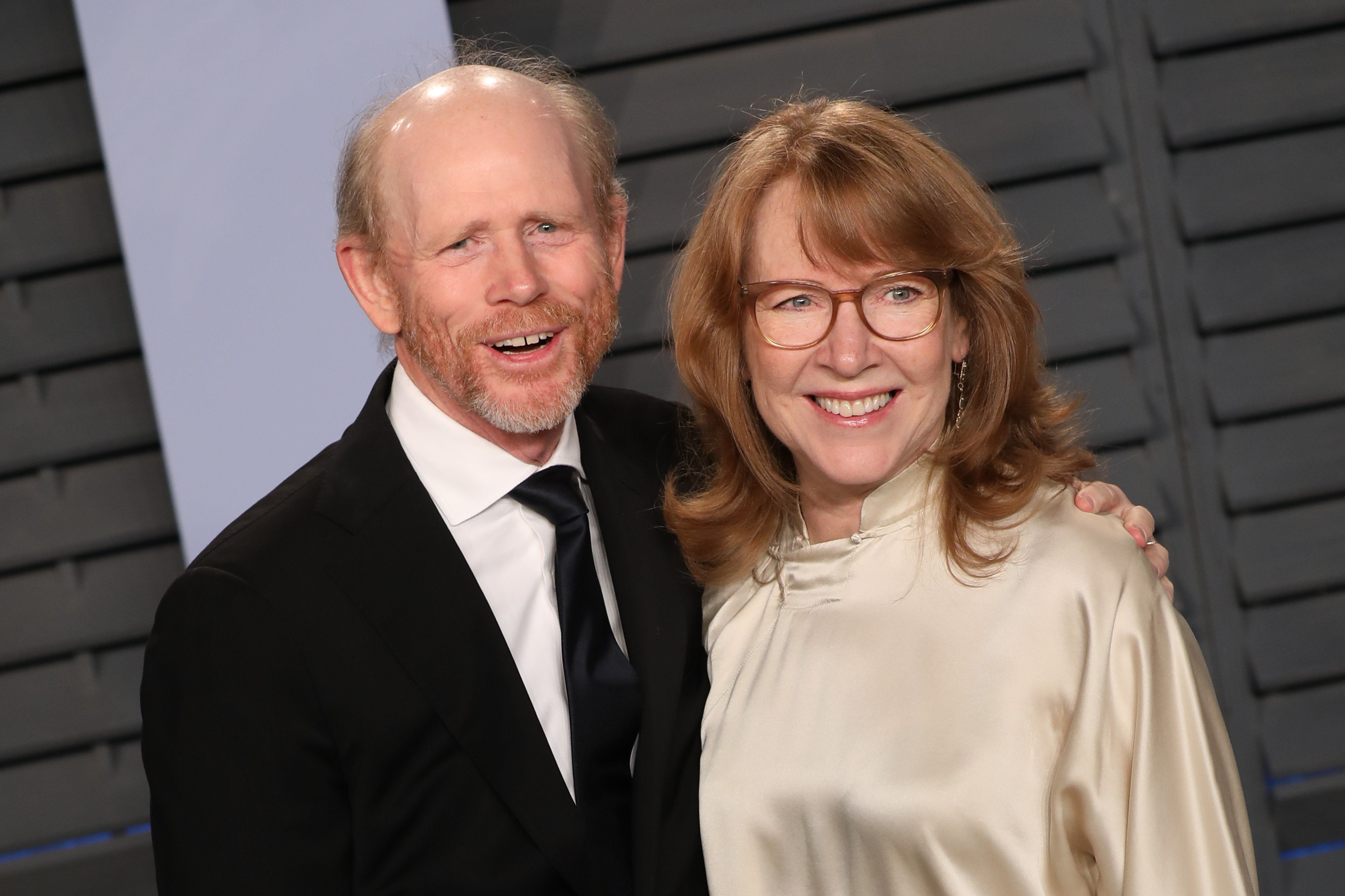 Ron Howard and Cheryl Howard attend the 2018 Vanity Fair Oscar Party hosted by Radhika Jones at Wallis Annenberg Center for the Performing Arts on March 04, 2018 in Beverly Hills, California. | Source: Getty Images