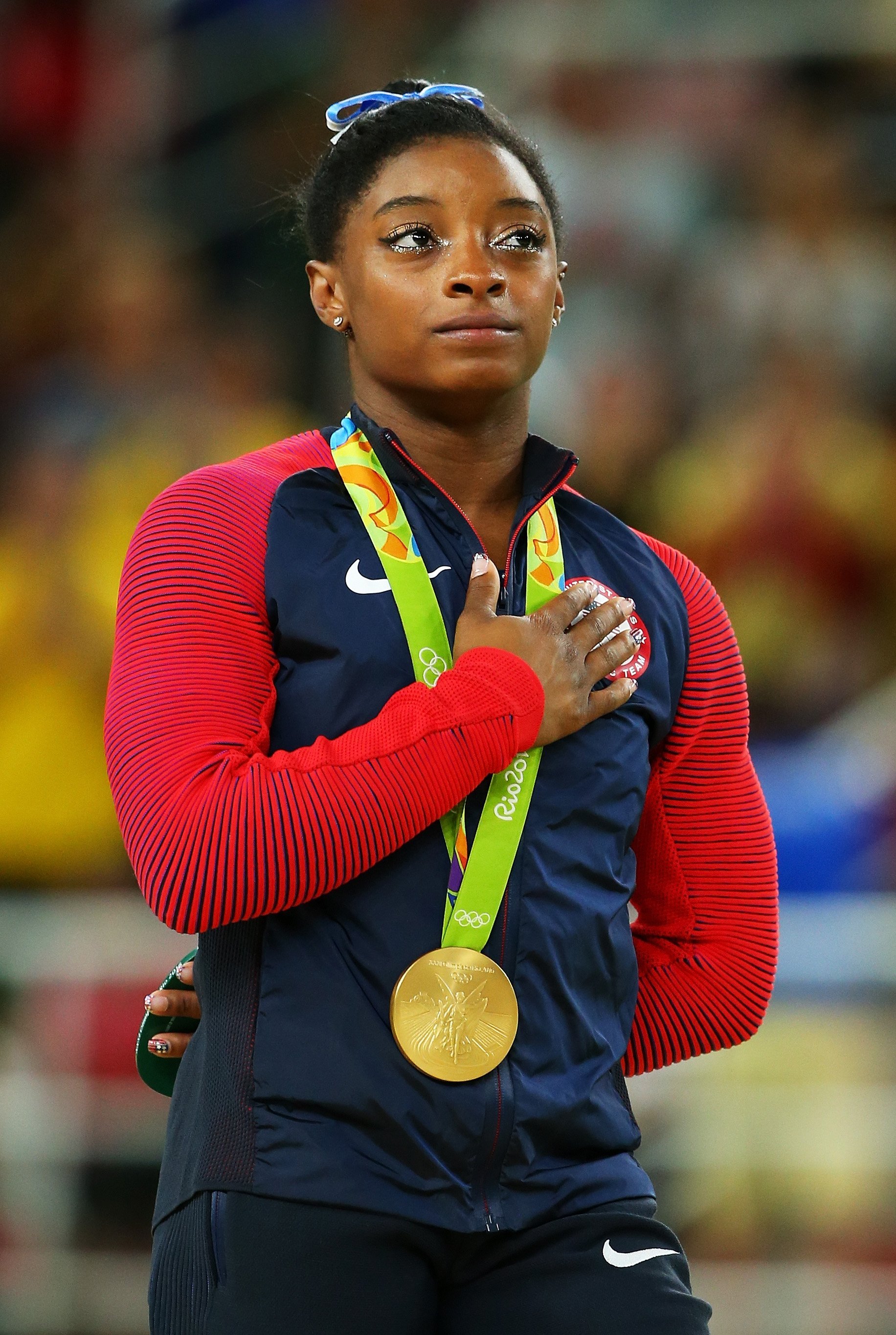  Simone Biles of the United States celebrates on the podium on Day 6 of the 2016 Rio Olympics. | Source: Getty Images