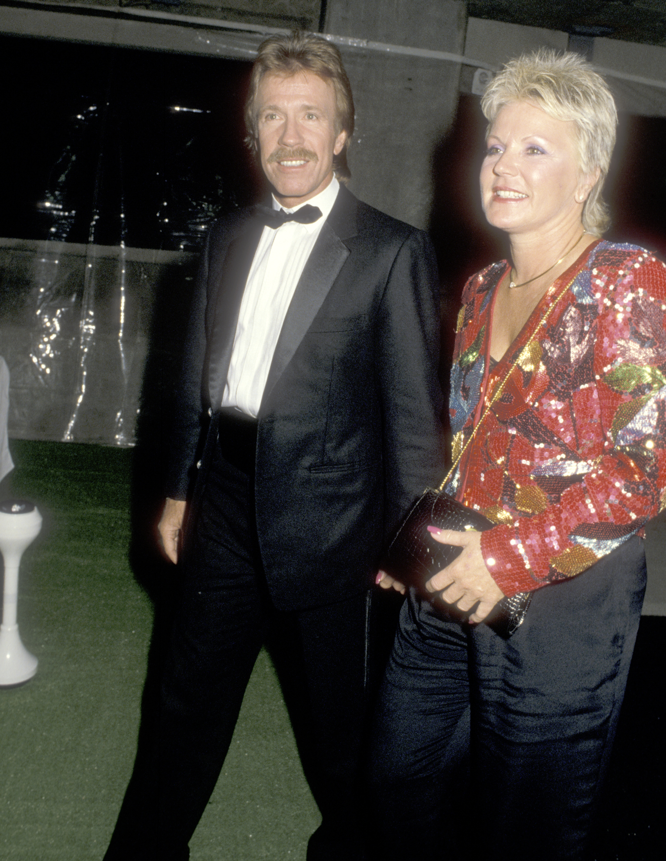 Chuck Norris and then-wife Dianne Holechek attend "The Naked Cage" Hollywood Premiere in California on February 22, 1986. | Source: Getty Images