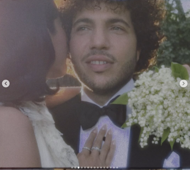 The couple shares a close embrace, with Selena Gomez holding her bouquet against Benny Blanco’s chest, as posted on September 27, 2025 | Source: Instagram/selenagomez