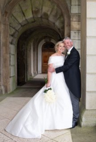 Carol Kirkwood and her husband Steve Randall smile together on their wedding day in a post shared on 29 December 2023. | Source: X/@carolkirkwood
