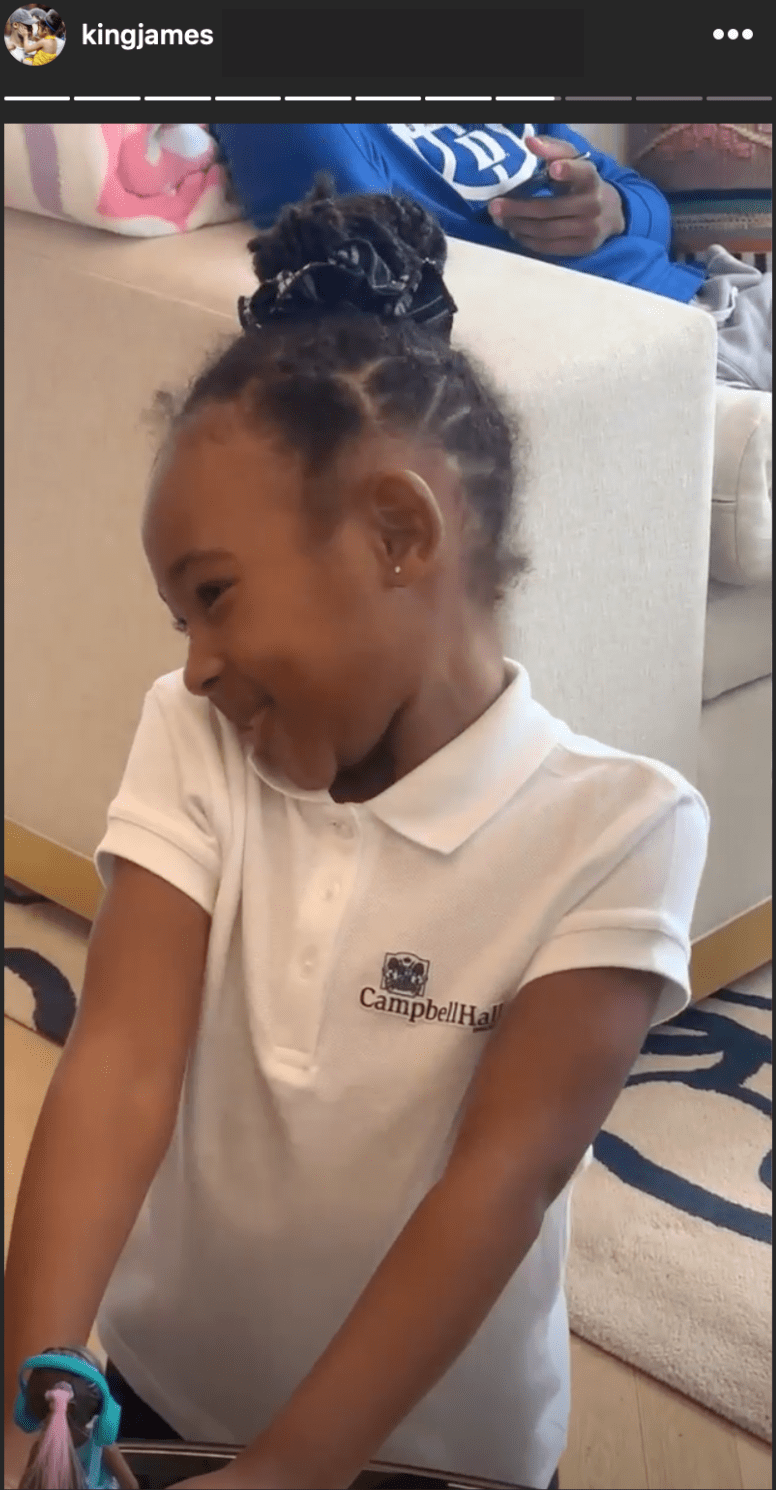 LeBron James' daughter Zhuri smiles as her dad sings her a birthday song. | Source: Instagram/kingjames