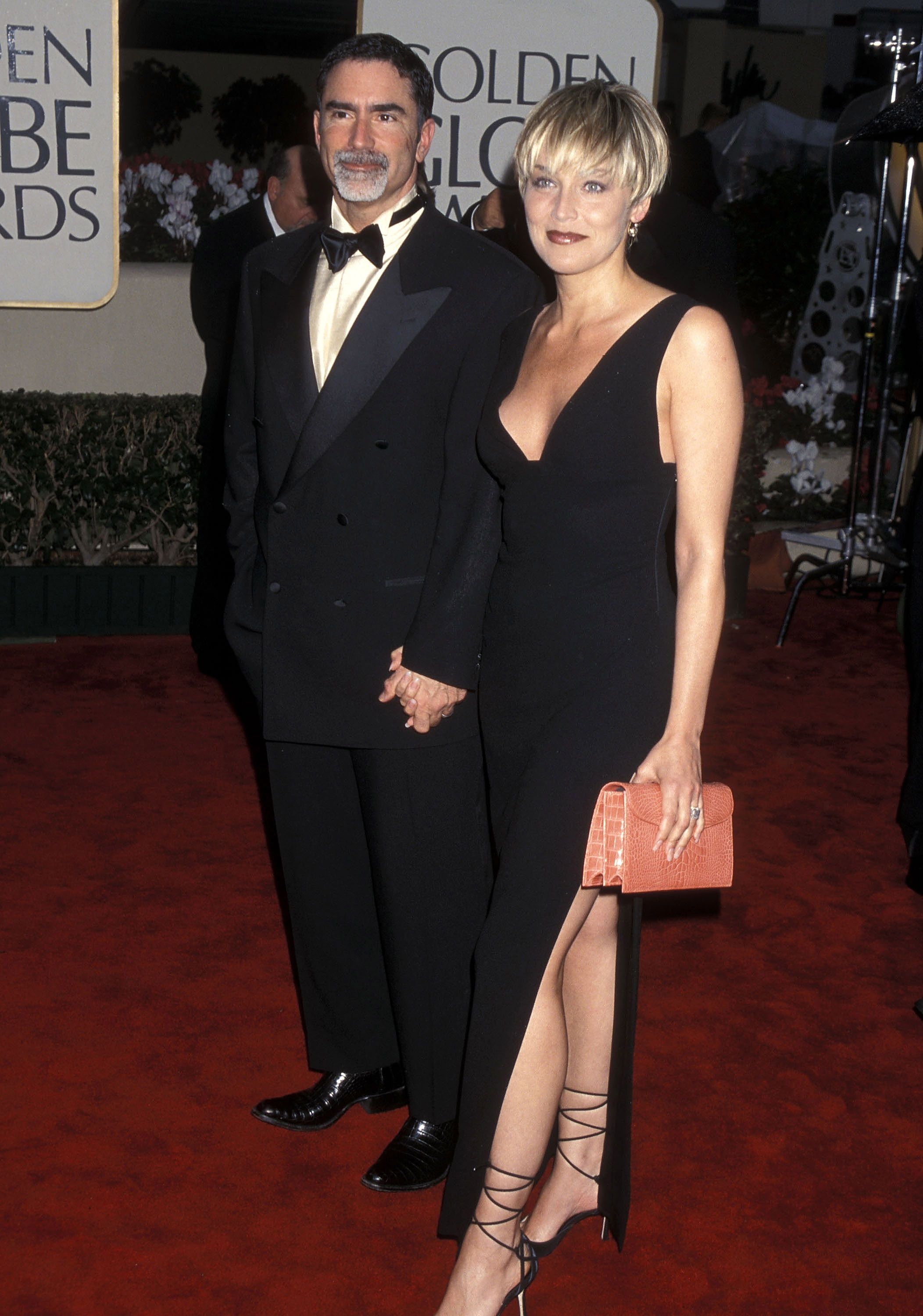 Sharon Stone and Phil Bronstein at the 57th Annual Golden Globe Awards in 2000 in Beverly Hills, California | Source: Getty Images