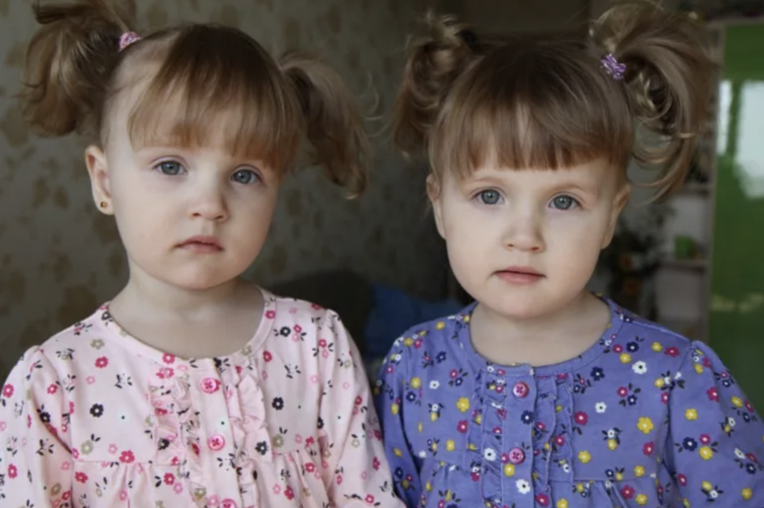 Two identical looking girls | Source: Shutterstock