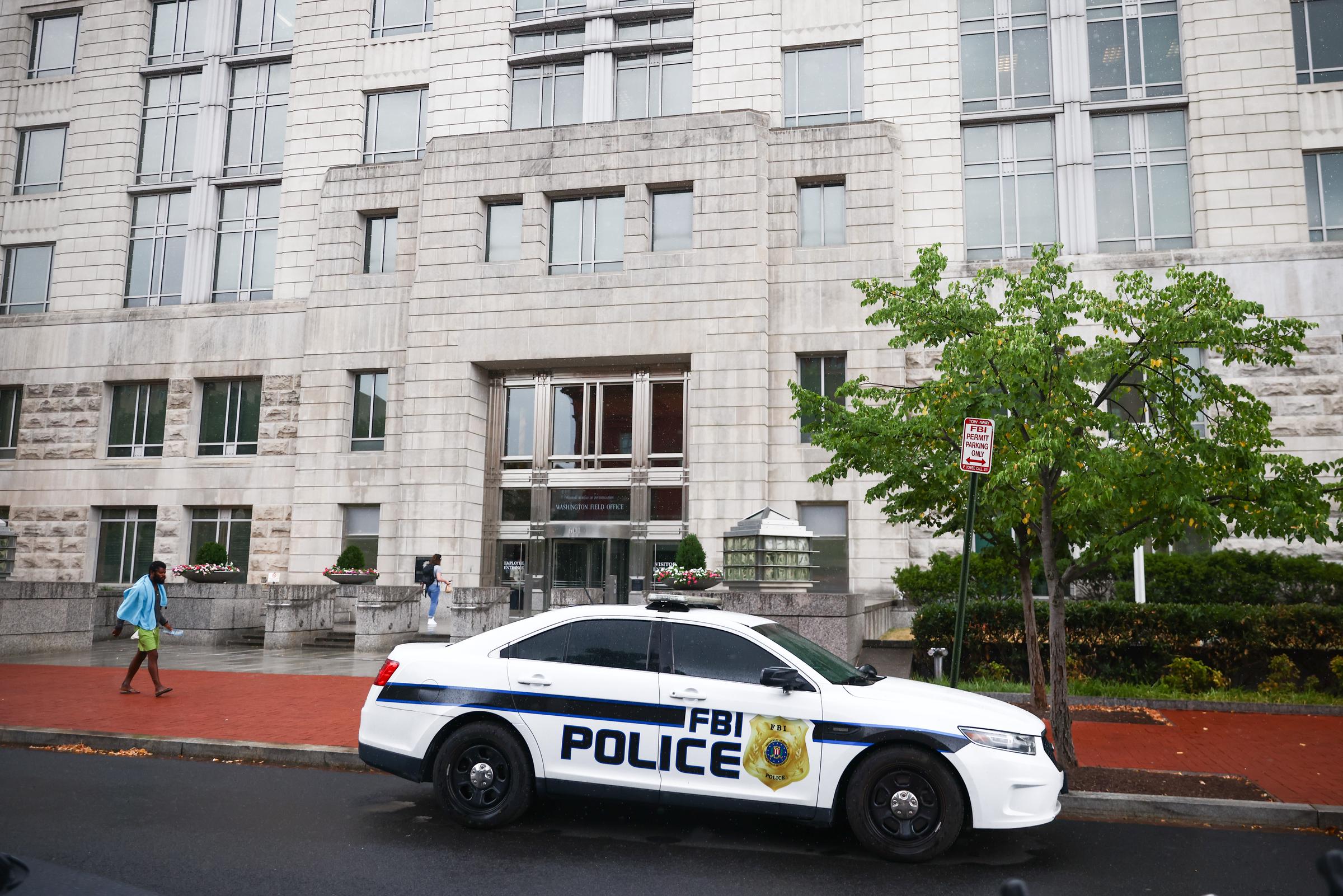 An FBI car parked in front of the Federal Bureau of Investigation Field Office building in Washington D.C. on July 12, 2024 | Source: Getty Images