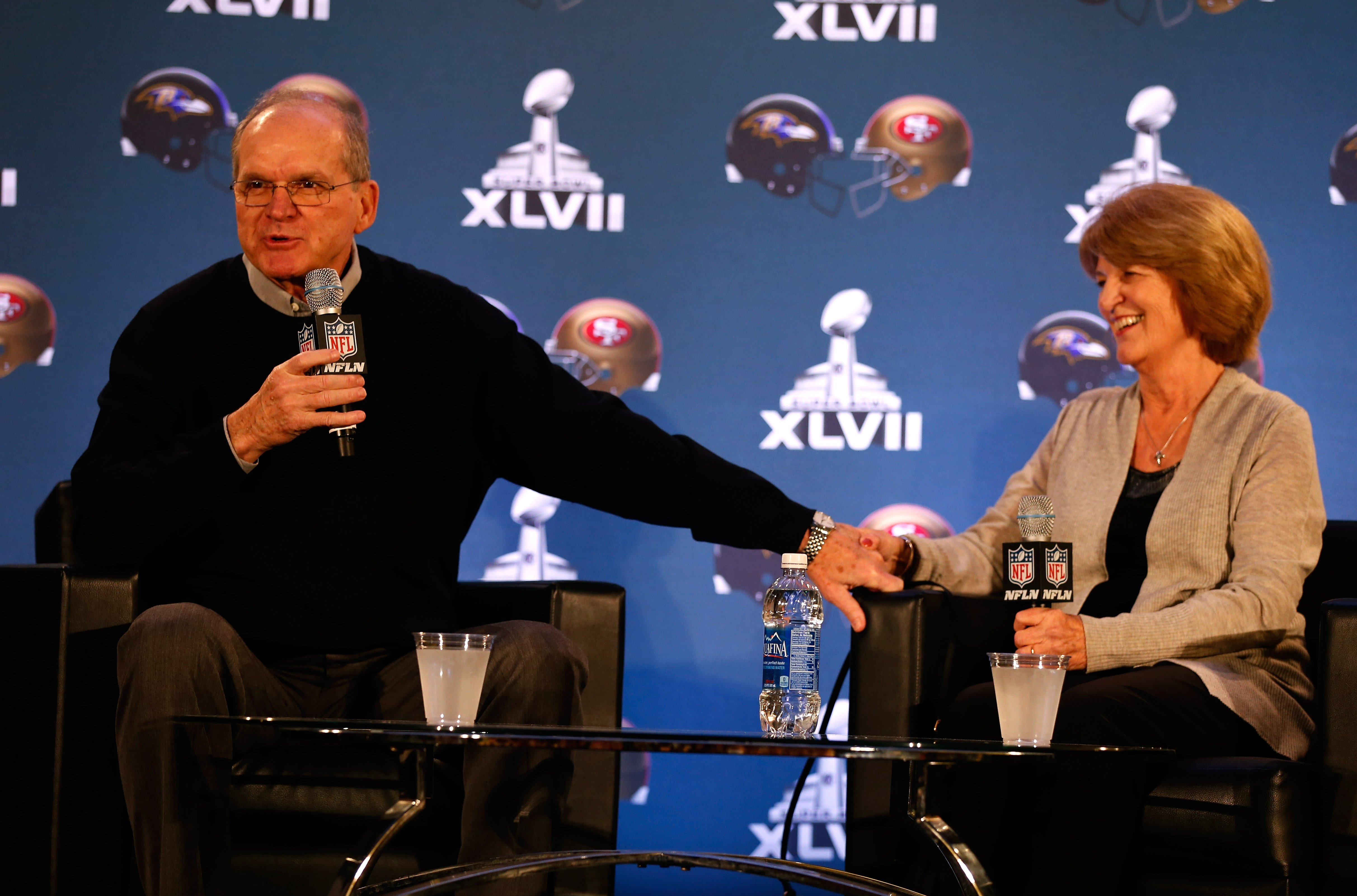 Jack and Jackie Harbaugh address the media during a news conference at the Media Center on, January 30, 2013, in New Orleans, Louisiana. | Source: Getty Images