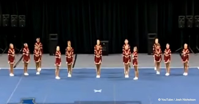 16 girls awarded first place trophy after stunning cheer routine