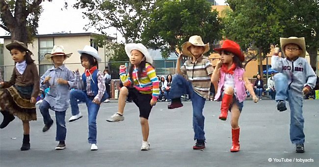 Tiny cowboys and cowgirls steal the show with adorable line dance to 'Achy Breaky Heart'