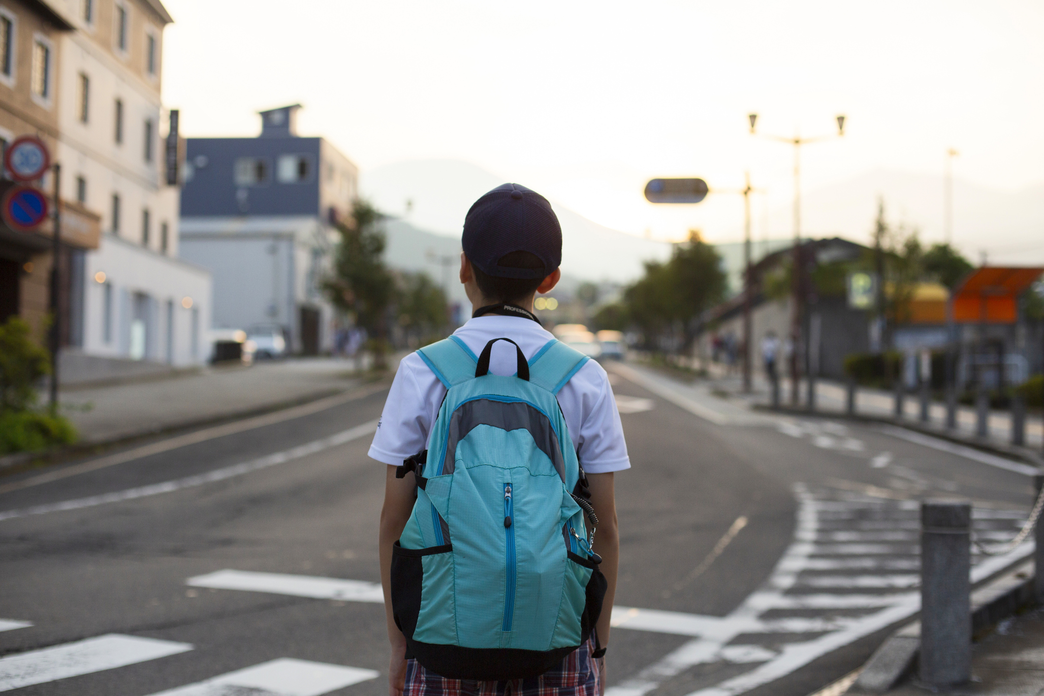 Boy walking home from school | Source: Getty Images