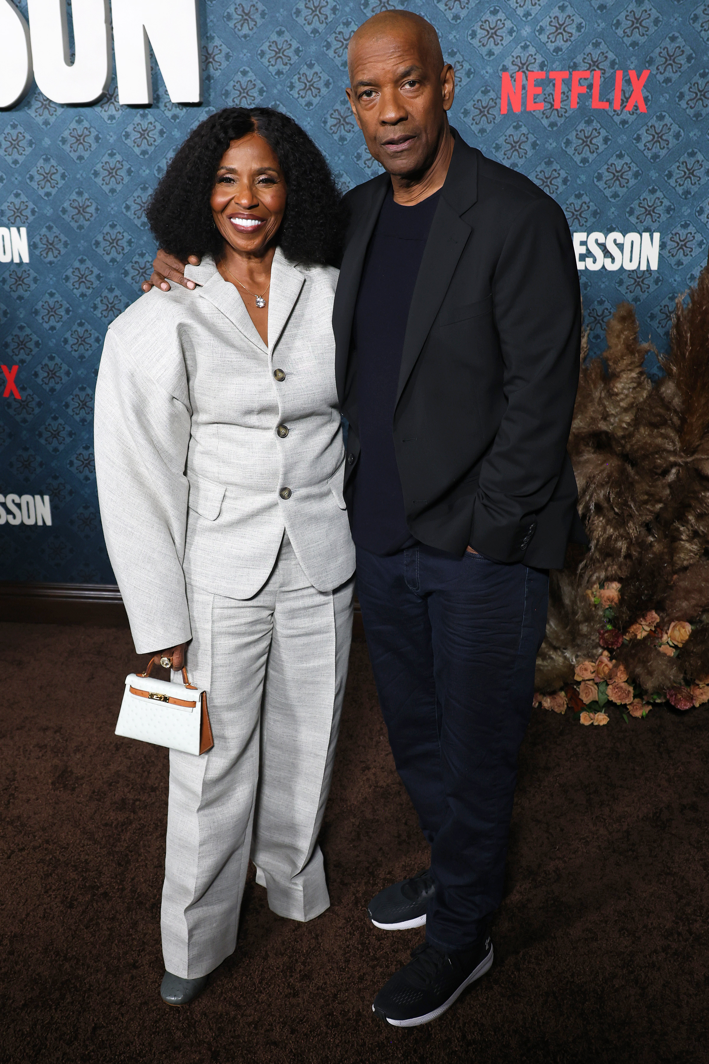 Pauletta and Denzel Washington at the premiere of "The Piano Lesson" on November 19, 2024, in Los Angeles, California | Source: Getty Images