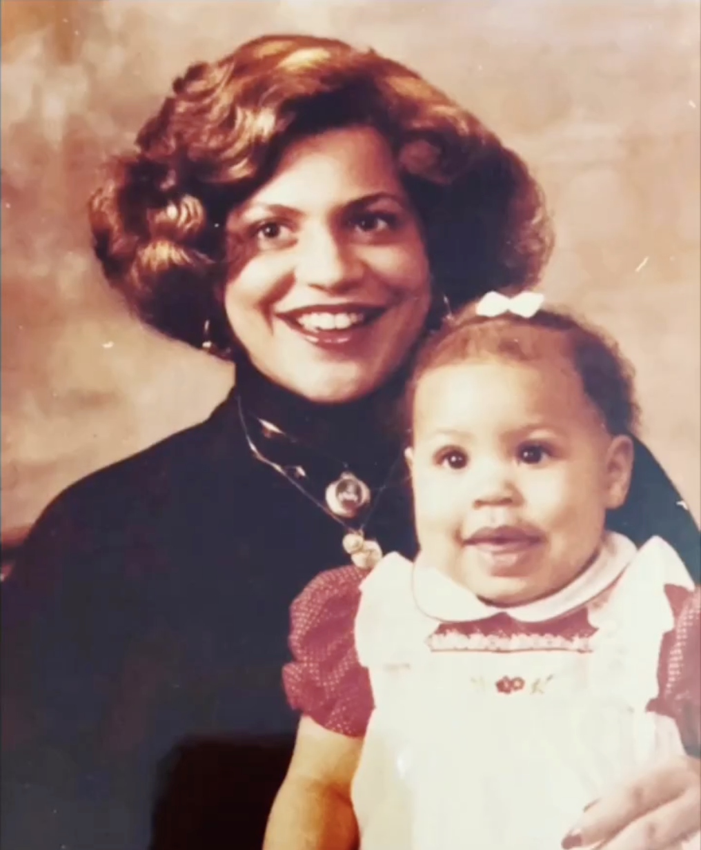 Sheinelle Jones as a baby and her mother smile for the camera, from a post dated May 14, 2023. | Source: Instagram/sheinelle_o