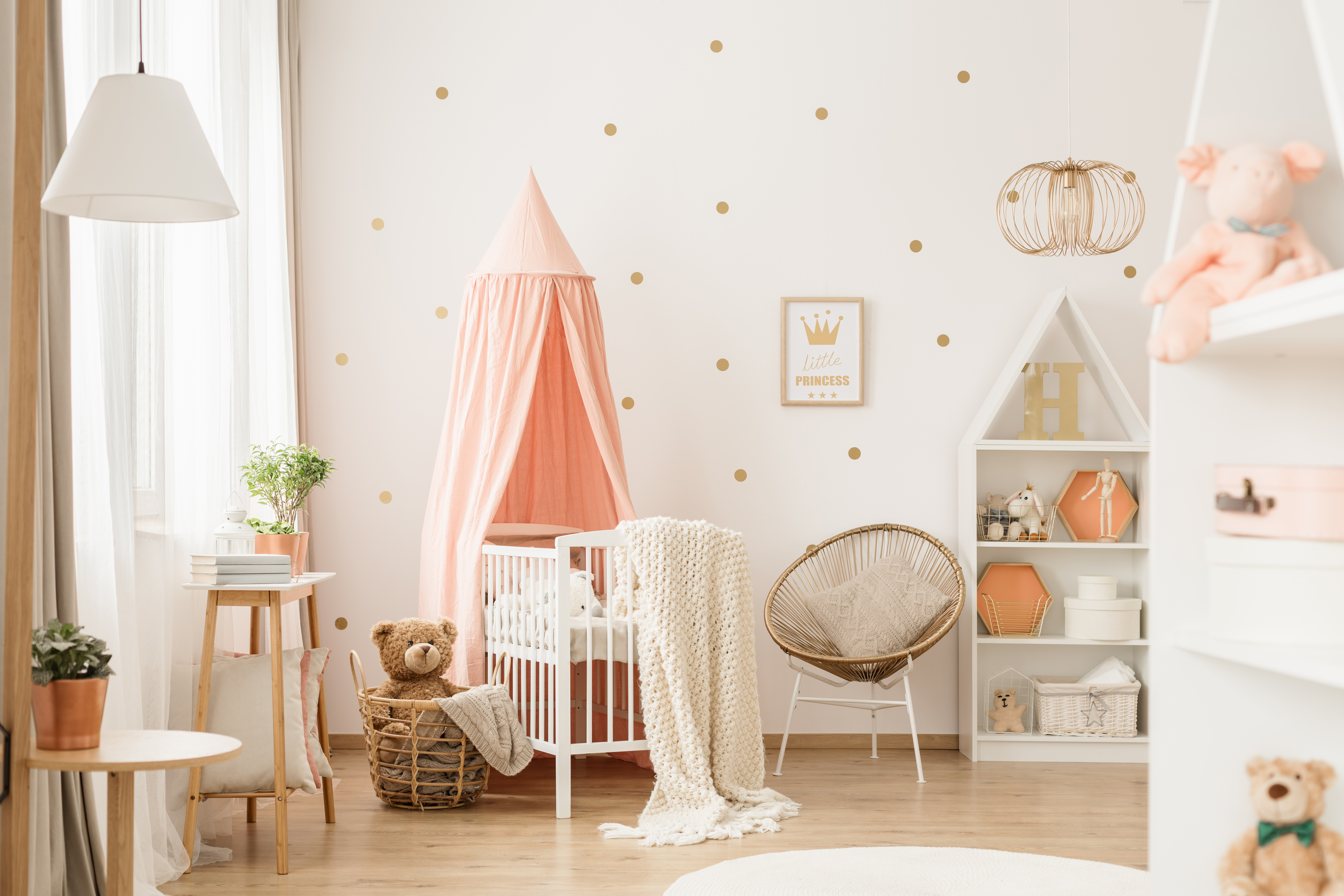 Gold and pink baby's bedroom | Source: Getty Images