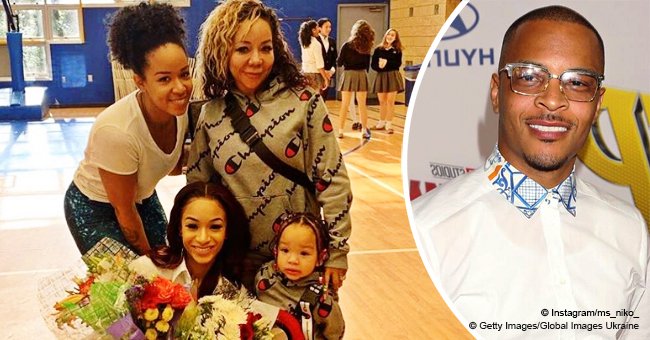 T.I.'s daughter Deyjah warms hearts, smiling with her biological mom & stepmom Tiny in photo