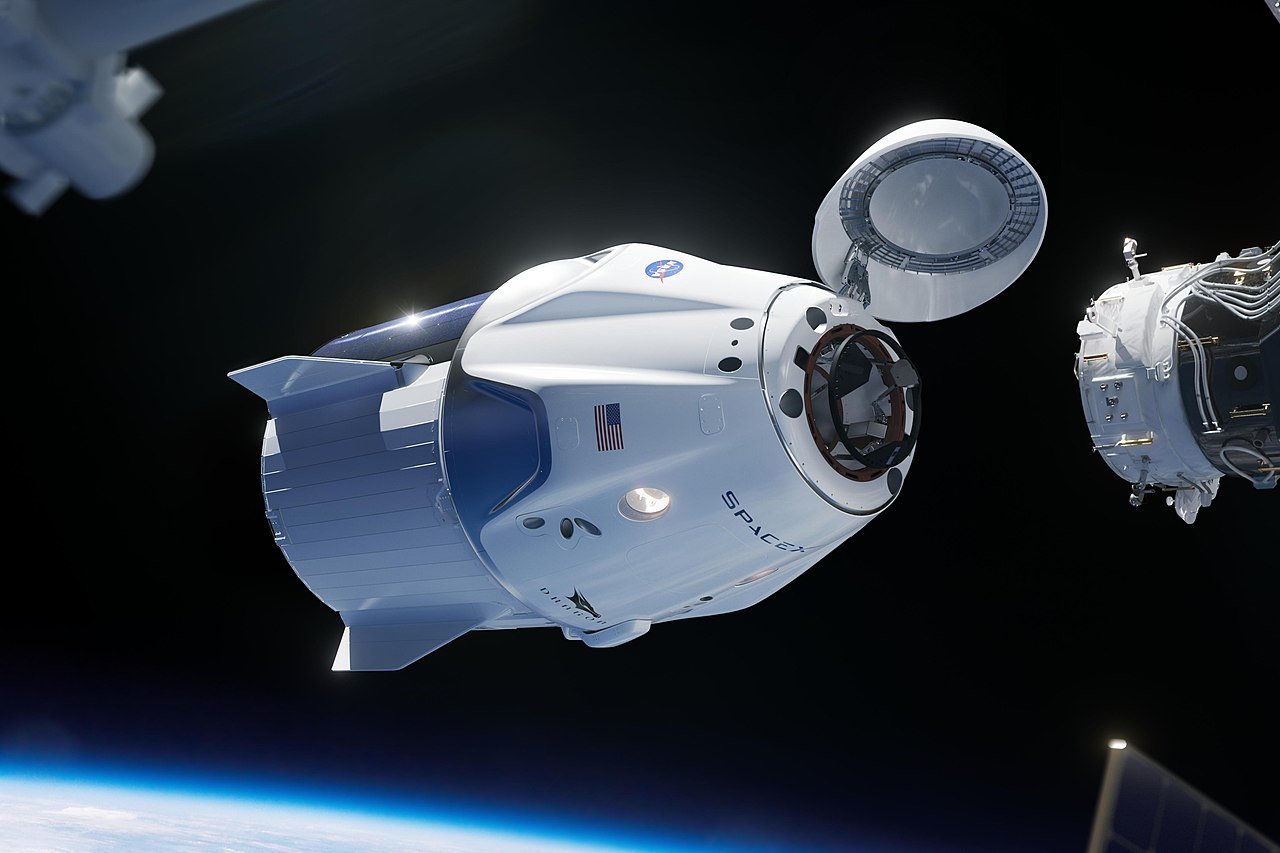 A rendering of a SpaceX Crew Dragon spacecraft approaching the International Space Station. Created on July 26, 2018 | Photo: Wikipedia/NASA/SpaceX