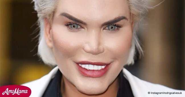Human Ken Doll dons skimpy red lingerie and a black wig revealing his new sexuality