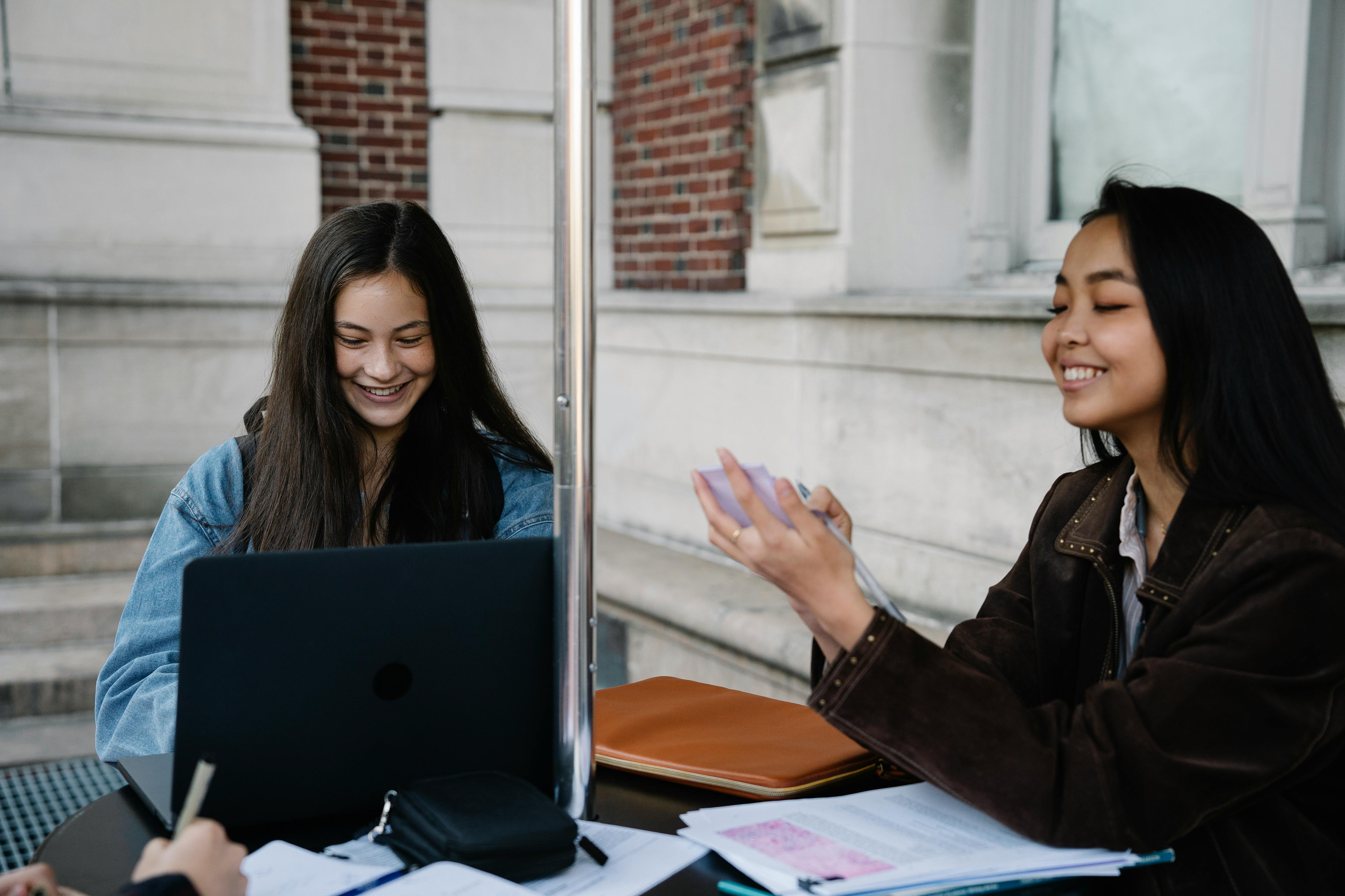 Two young women studying | Source: Pexels