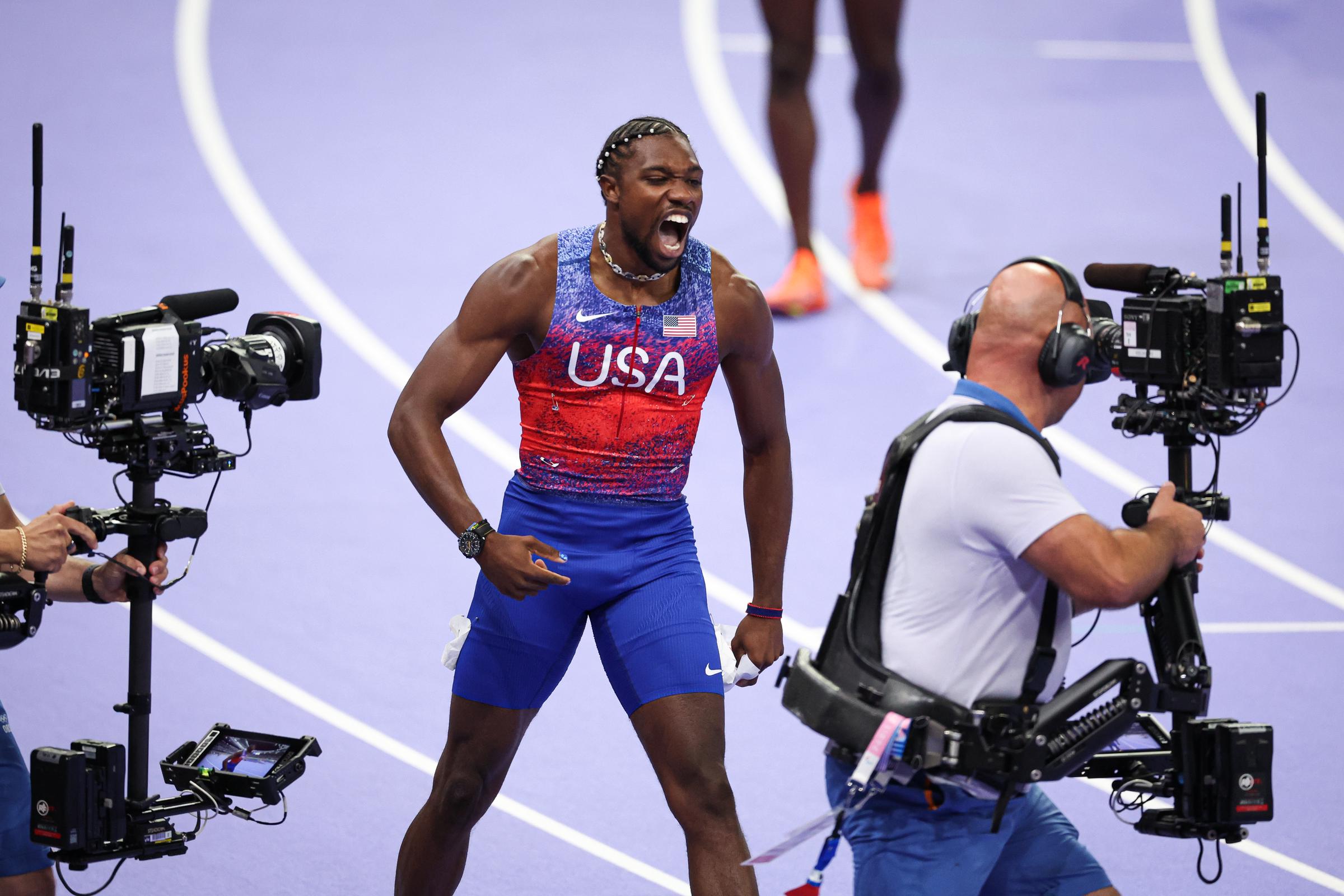 Noah Lyles celebrating winning the Men's 100-meter Final of the Olympic Games Paris 2024 on August 4, in France. | Source: Getty Images