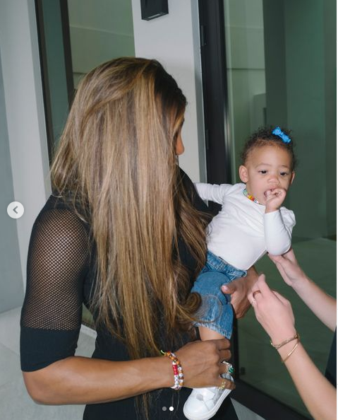 Tennis legend Serena Williams holding her one year old daughter Adira posted on October 22, 2024 | Source: Instagram/serenawilliams