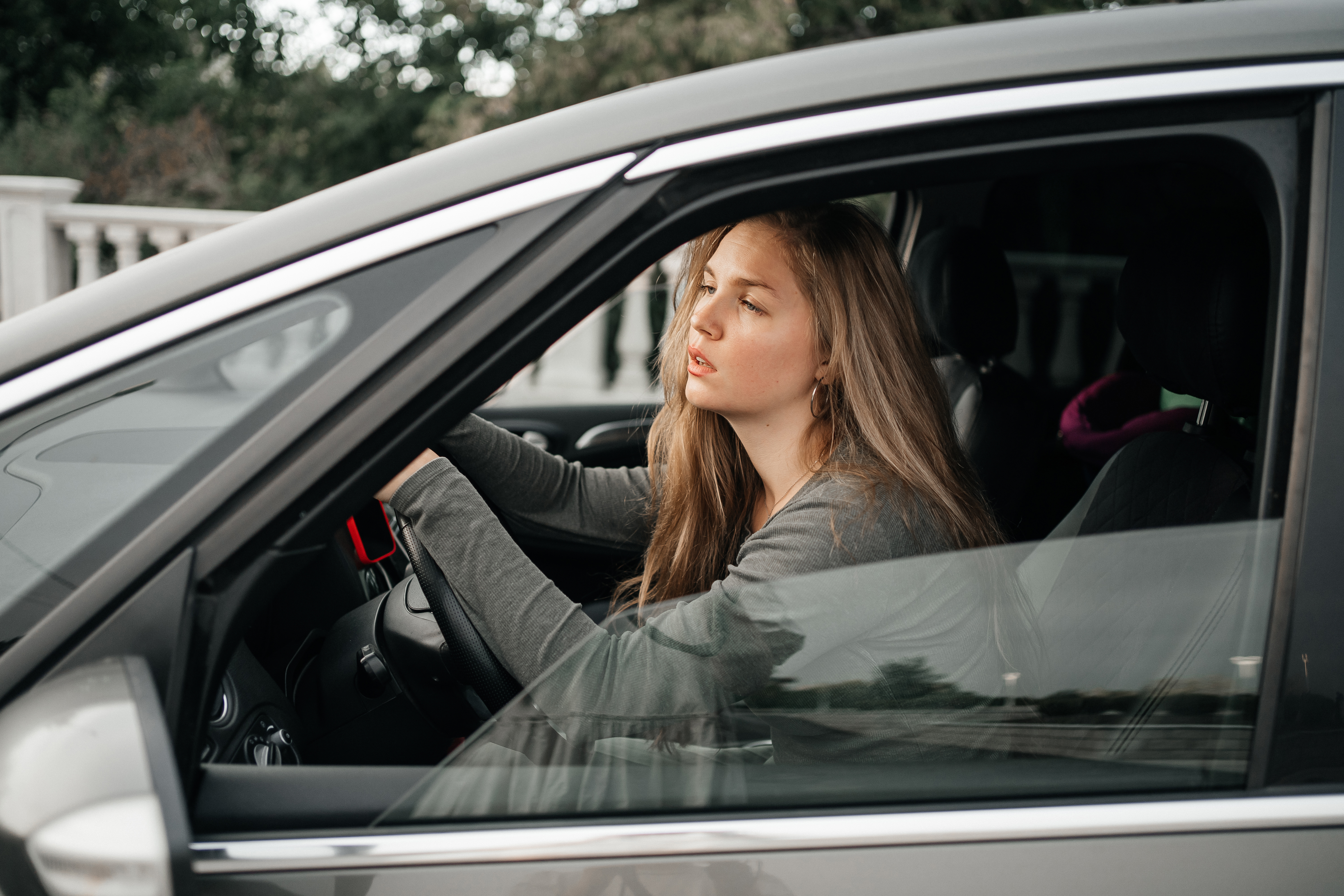 Anxious woman driving with depression | Source: Getty Images