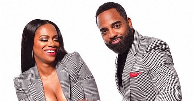 Kandi Burruss Stuns as She Poses in a Luxurious Yellow Dress with Her ...