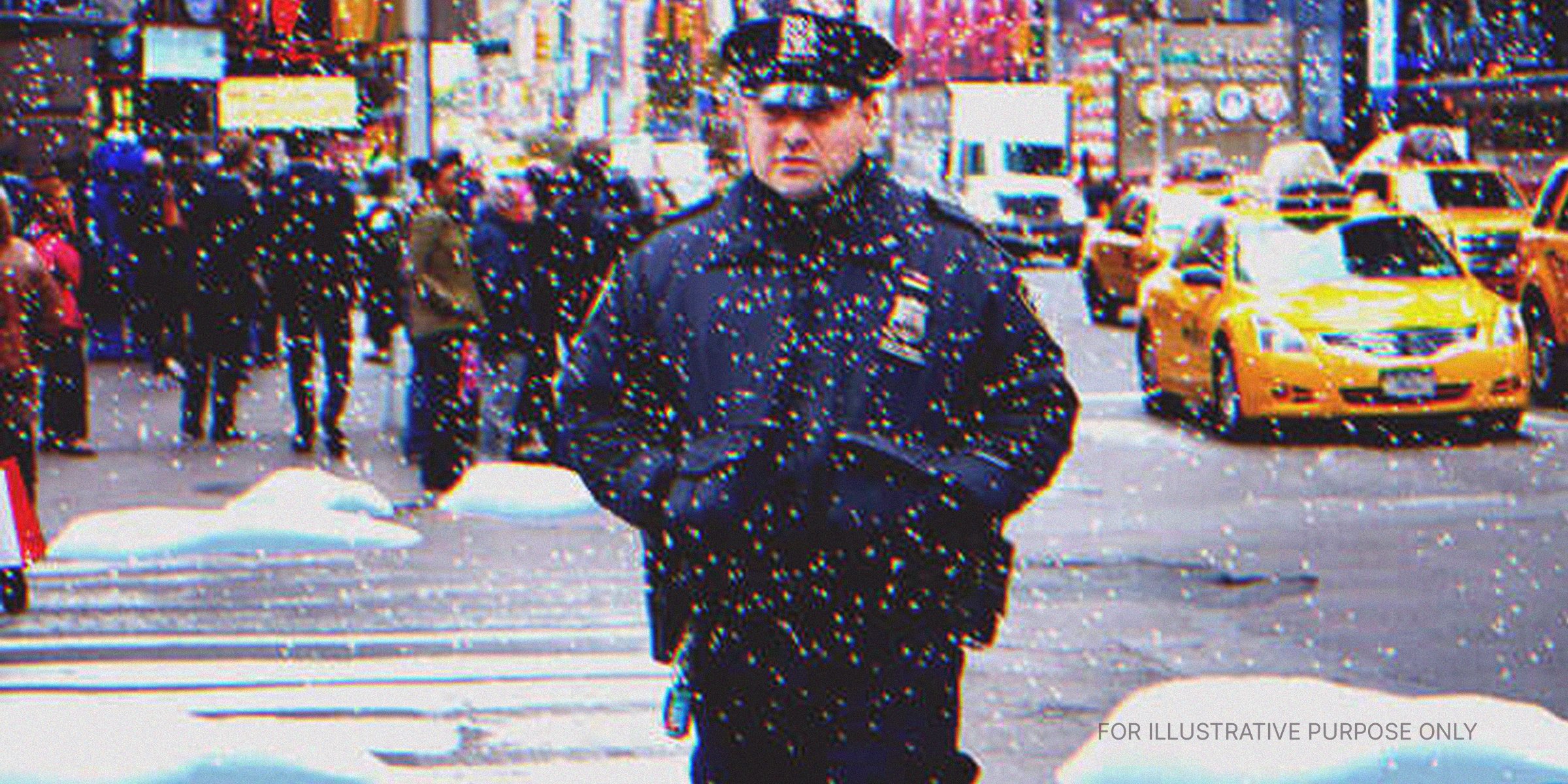 Cop Standing On A Snowy Street. | Source: Shutterstock