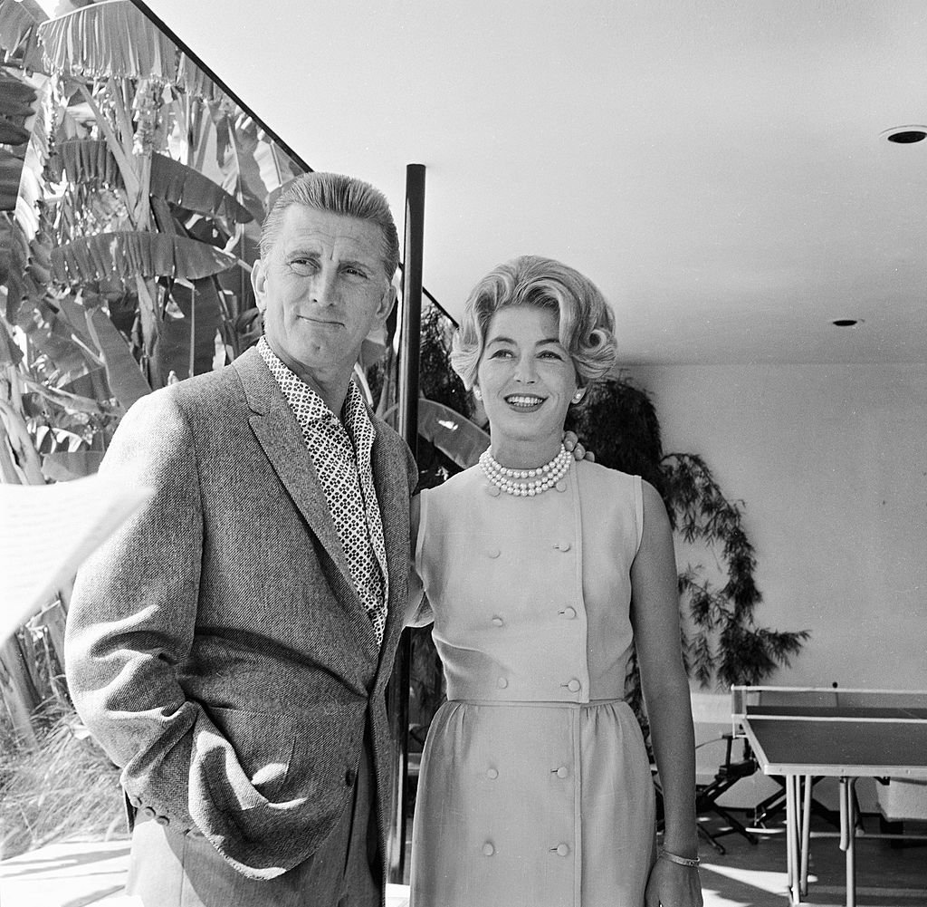 Kirk Douglas and his wife Anne stand on an episode of 'Person to Person' hosted by Edward R. Murrow, September 23, 1960. | Source: Getty Images.