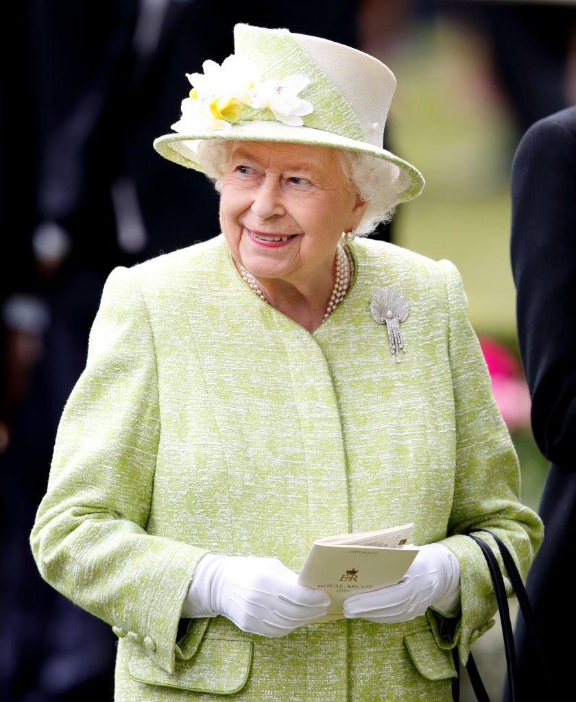 Queen Elizabeth II (wearing the Courtauld Thomson Scallop-Shell Brooch) at day five of Royal Ascot at Ascot Racecourse on June 22, 2019 | Photo: Getty Images