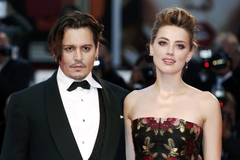 Jhonny Depp y Amber Heard.| Imagen tomada de: Shutterstock Jhonny Depp y Amber Heard.| Imagen tomada de: Shutterstock