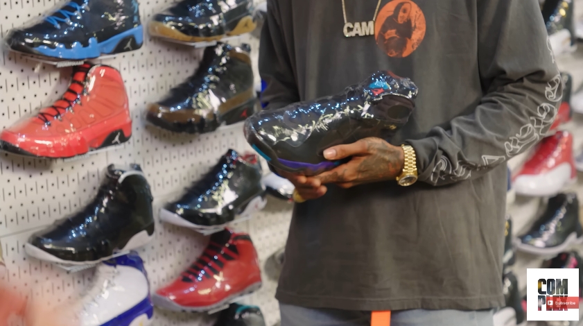 A closer look at the Air Jordan VIII "Aqua" sneakers that Wiz Khalifa revisited while reflecting on one of the most memorable photo shoots of his career. | Source: YouTube/Complex