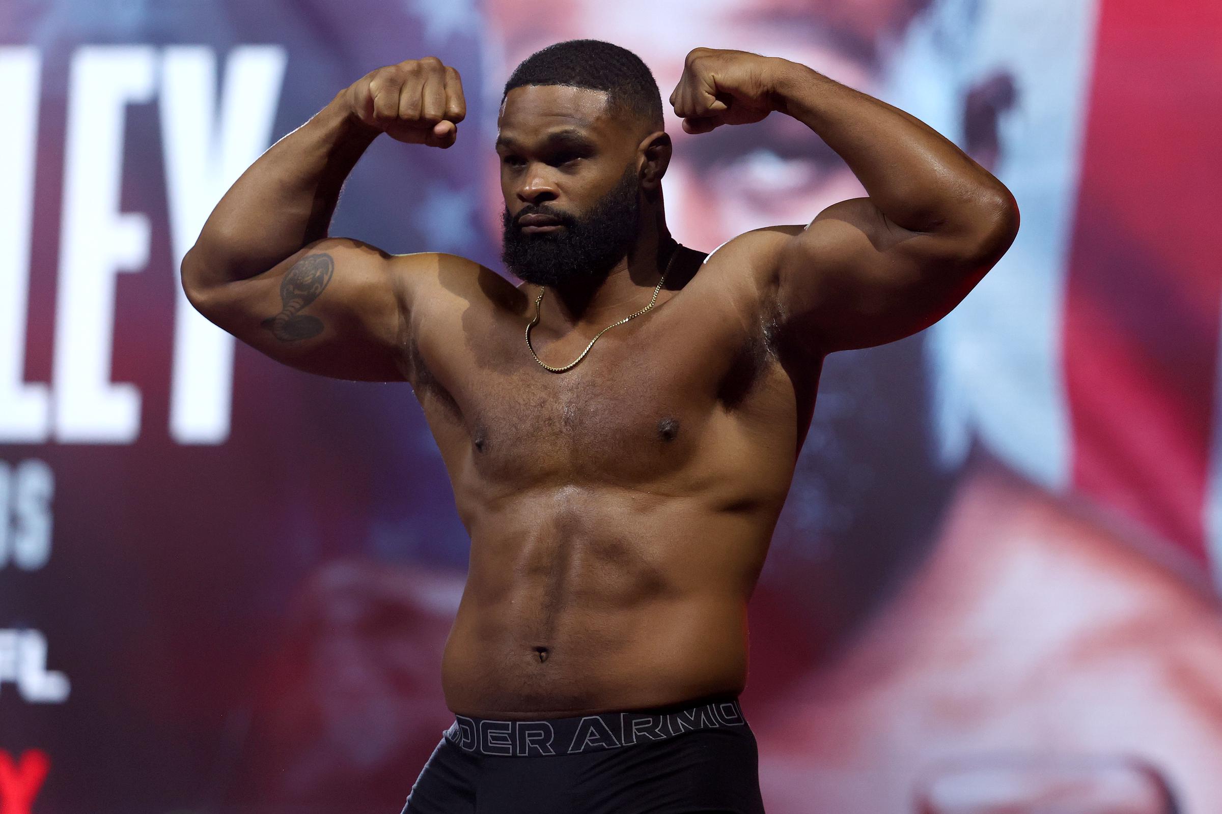 Tyron Woodley poses on the scale during his ceremonial weigh-in ahead of his fight as part of Jake Paul v Anthony Joshua at The Fillmore Miami Beach on December 18, 2025, in Miami Beach, Florida. | Source: Getty Images