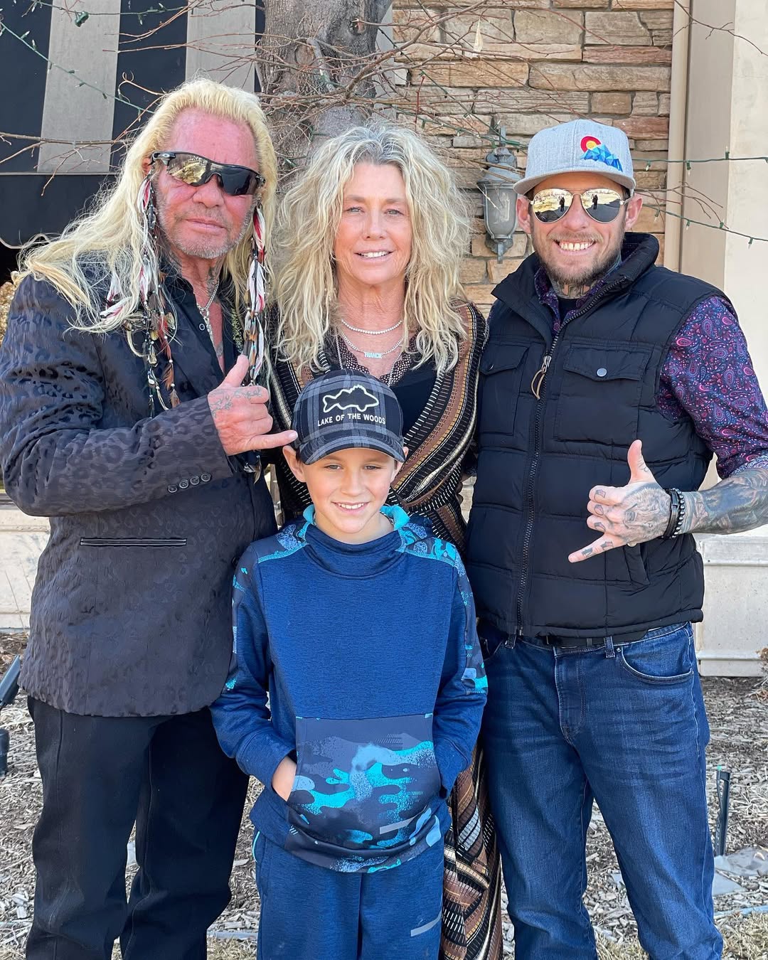 Anthony (C) is pictured alongside his grandparents, Duane and Francie Chapman, and his father Gregory Zecca (R). | Source: Instagram/franciedogchapman