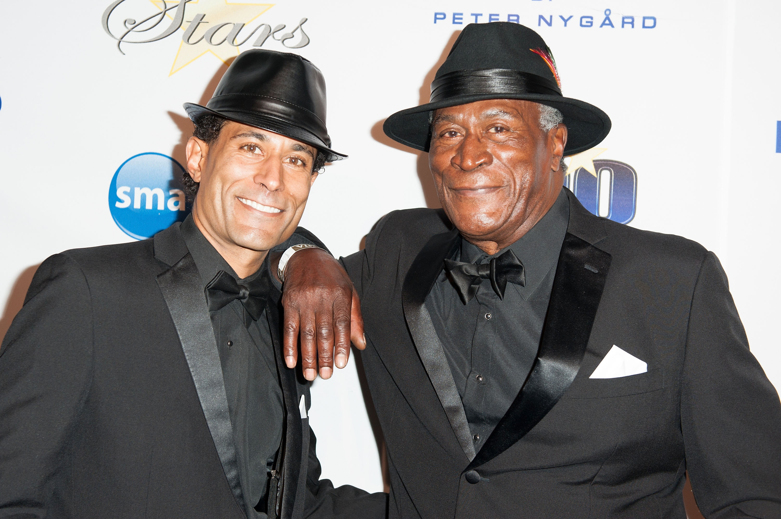 Casey and John Amos at The Norby Walters 25th Annual Night of 100 Stars Oscar Viewing Gala on February 22, 2015, in Beverly Hills, California | Source: Getty Images
