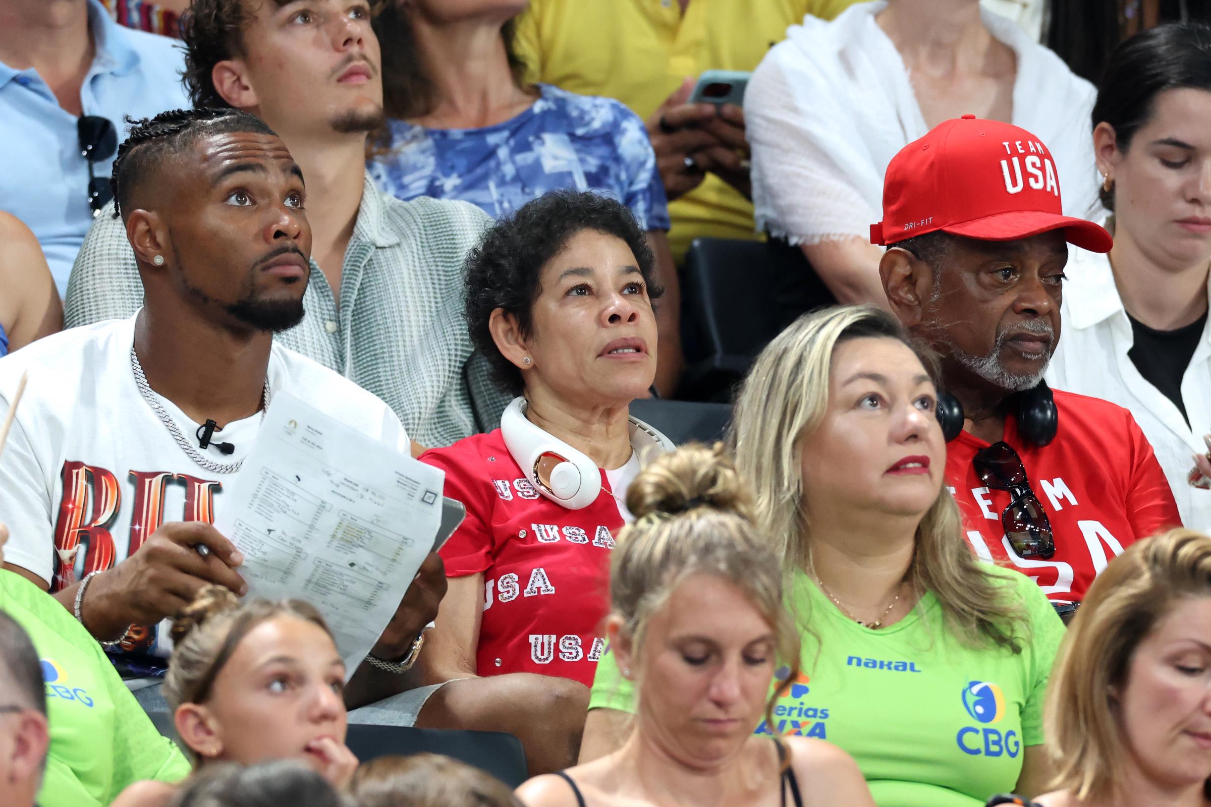 Jonathan Owens and Simone Biles' parents Nellie and Ronald Biles during the Artistic Gymnastics Women's Team Final at the Paris Olympic Games on July 30, 2024, in Paris, France | Source: Getty Images