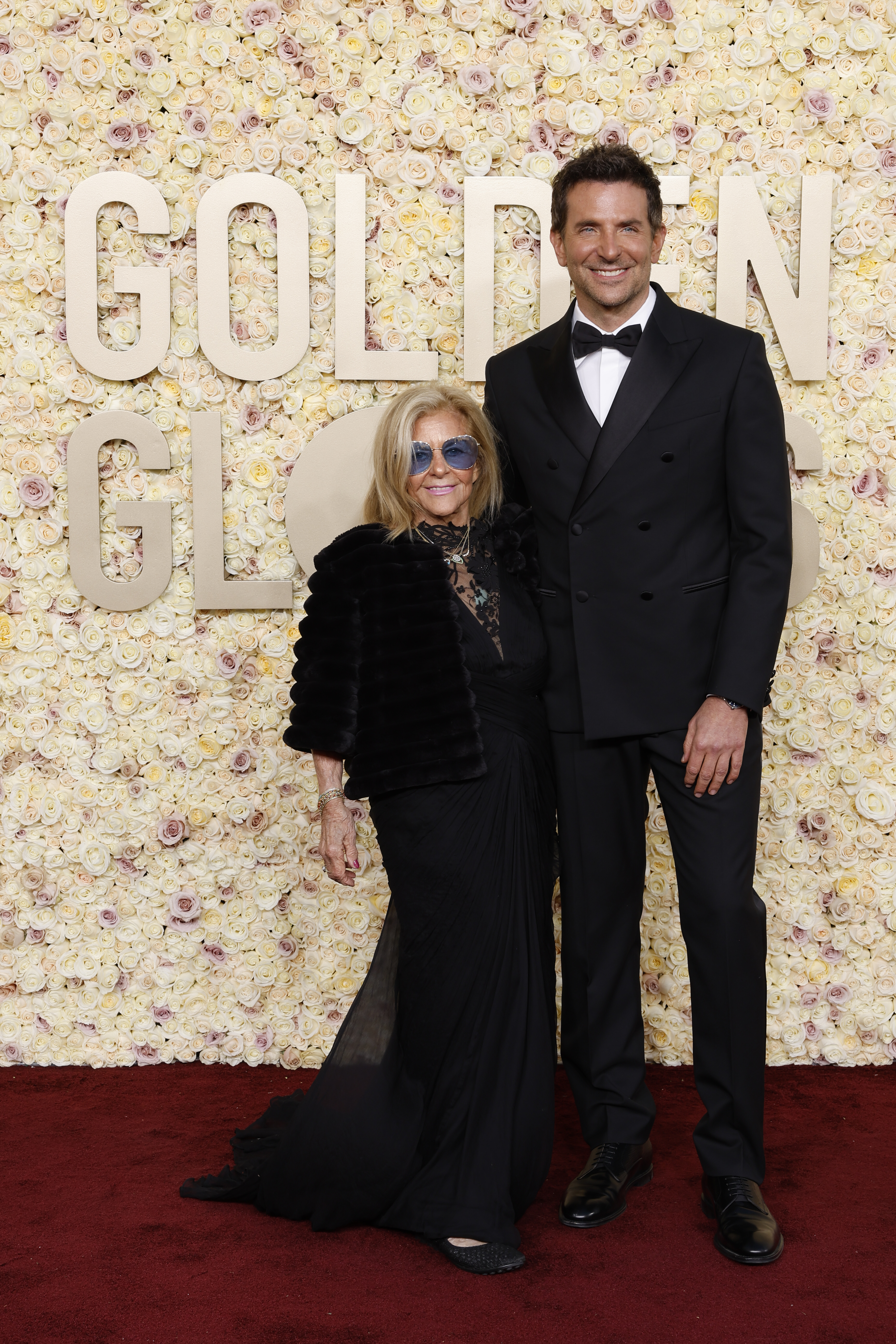 Gloria Campano and Bradley Cooper at the 81st Golden Globe Awards in January 2024 | Source: Getty Images