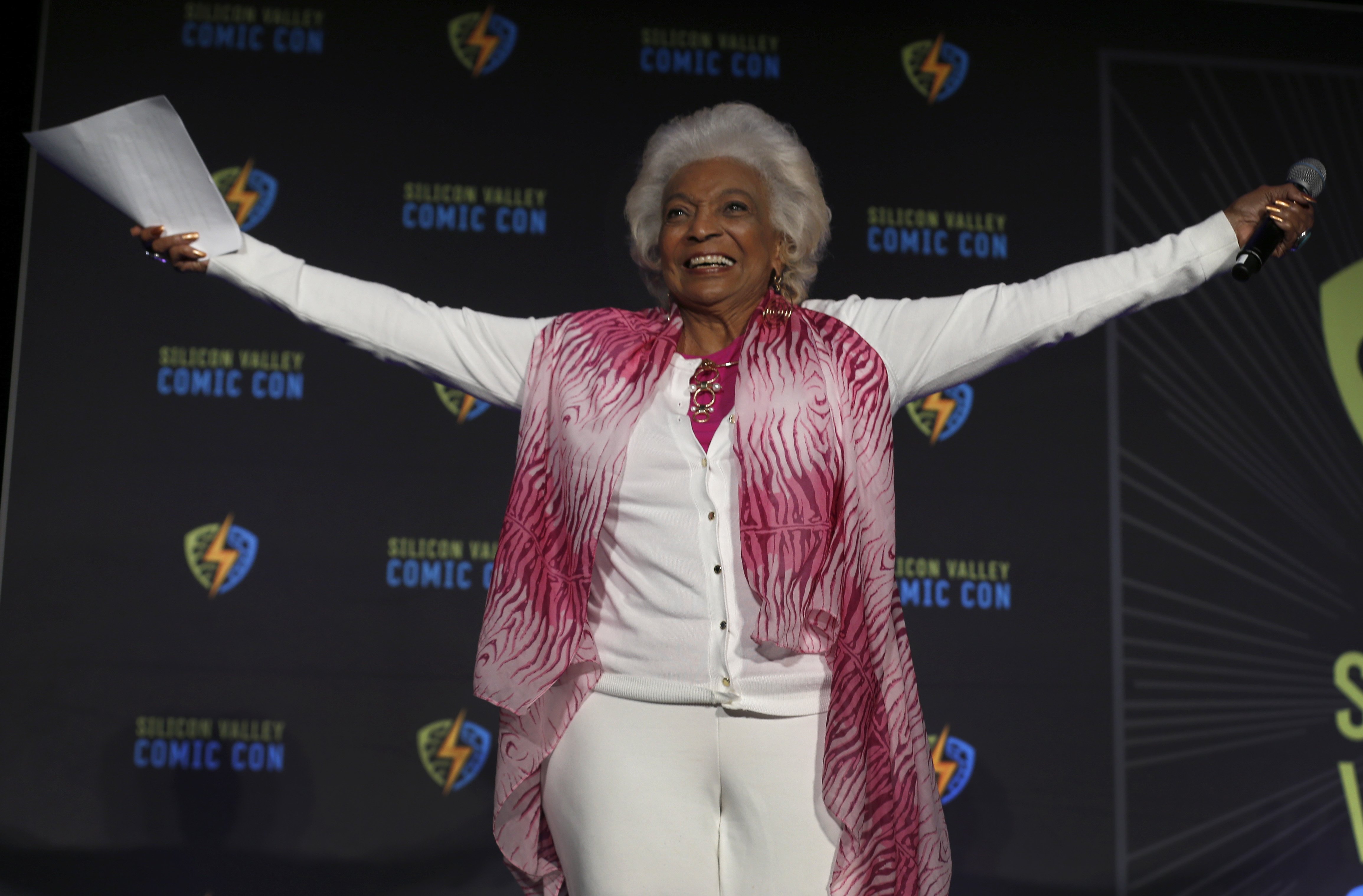 Actress Nichelle Nichols, who portrayed Lt. Uhura in the original Star Trek series introducing NASA astronaut Dr. Mae Jemison at the Silicon Valley Comic Con in San Jose, Calif. on Saturday, April 7, 2018. | Source: Getty Images 