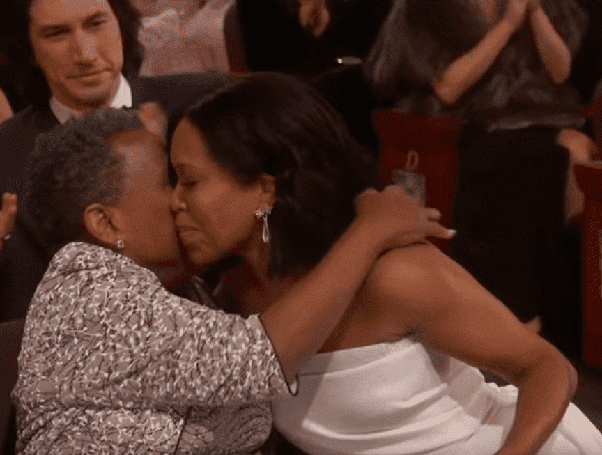 Screenshot of Regina King hugging her mother after she is announced as the winner of the “Actress In a Supporting Role” category at the 2019 Academy Awards. | Photo: YouTube/ABC