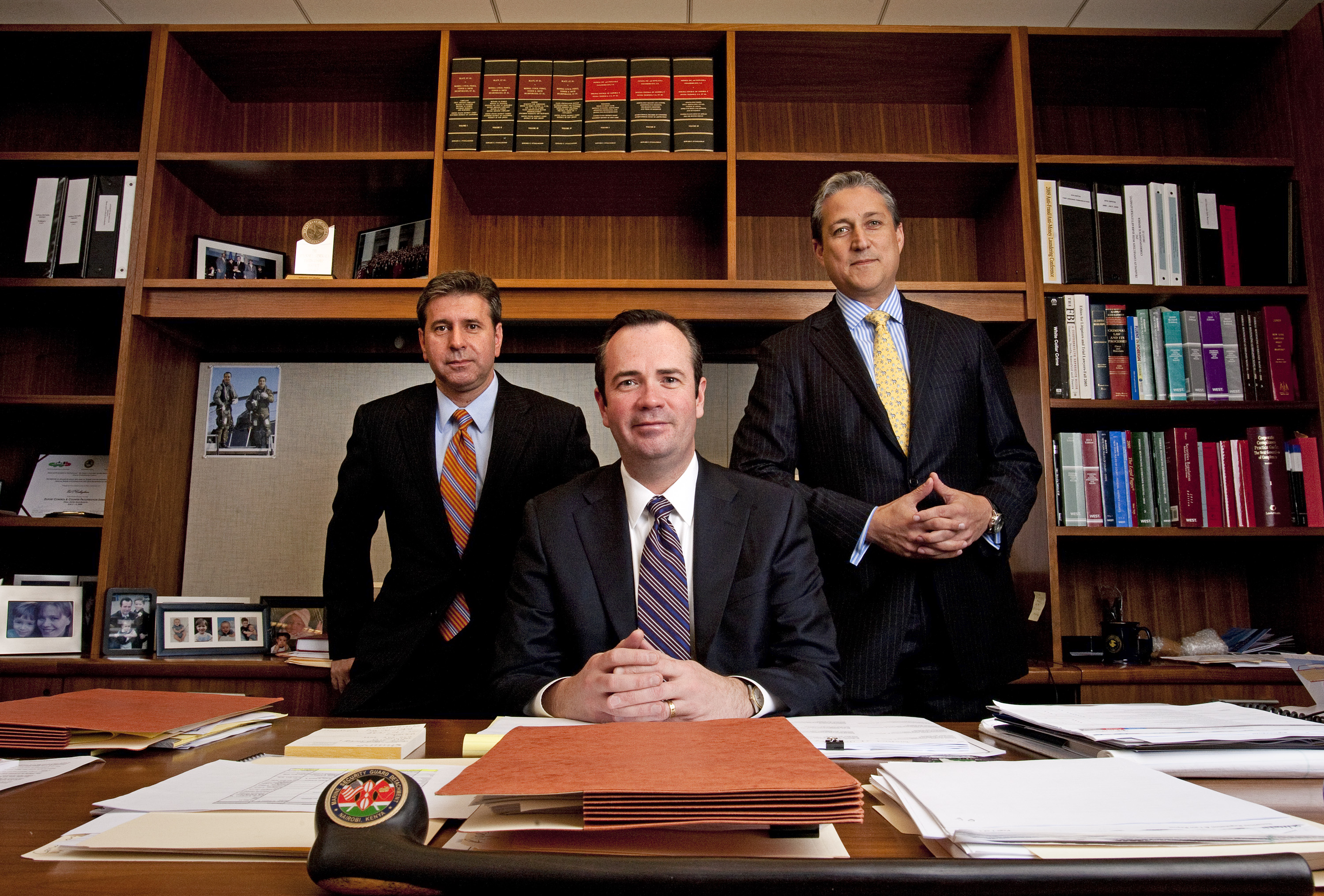 Christopher Morvillo posing for a picture with fellow Clifford Chance partners, Edward C. O'Callaghan, and David B. Raskin, in New York on December 21, 2011 | Source: Getty Images