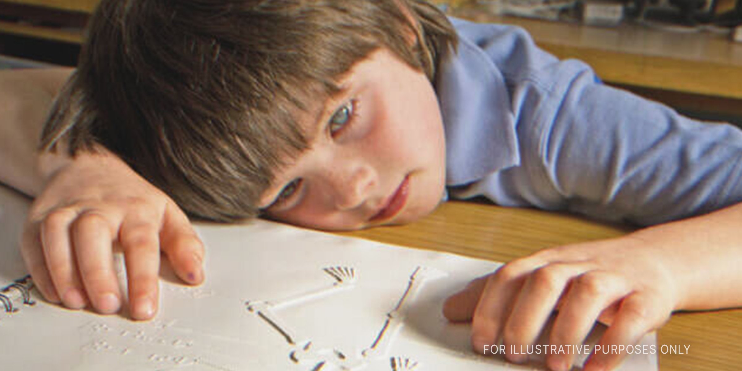 Blind boy at desk | Source: Getty Images