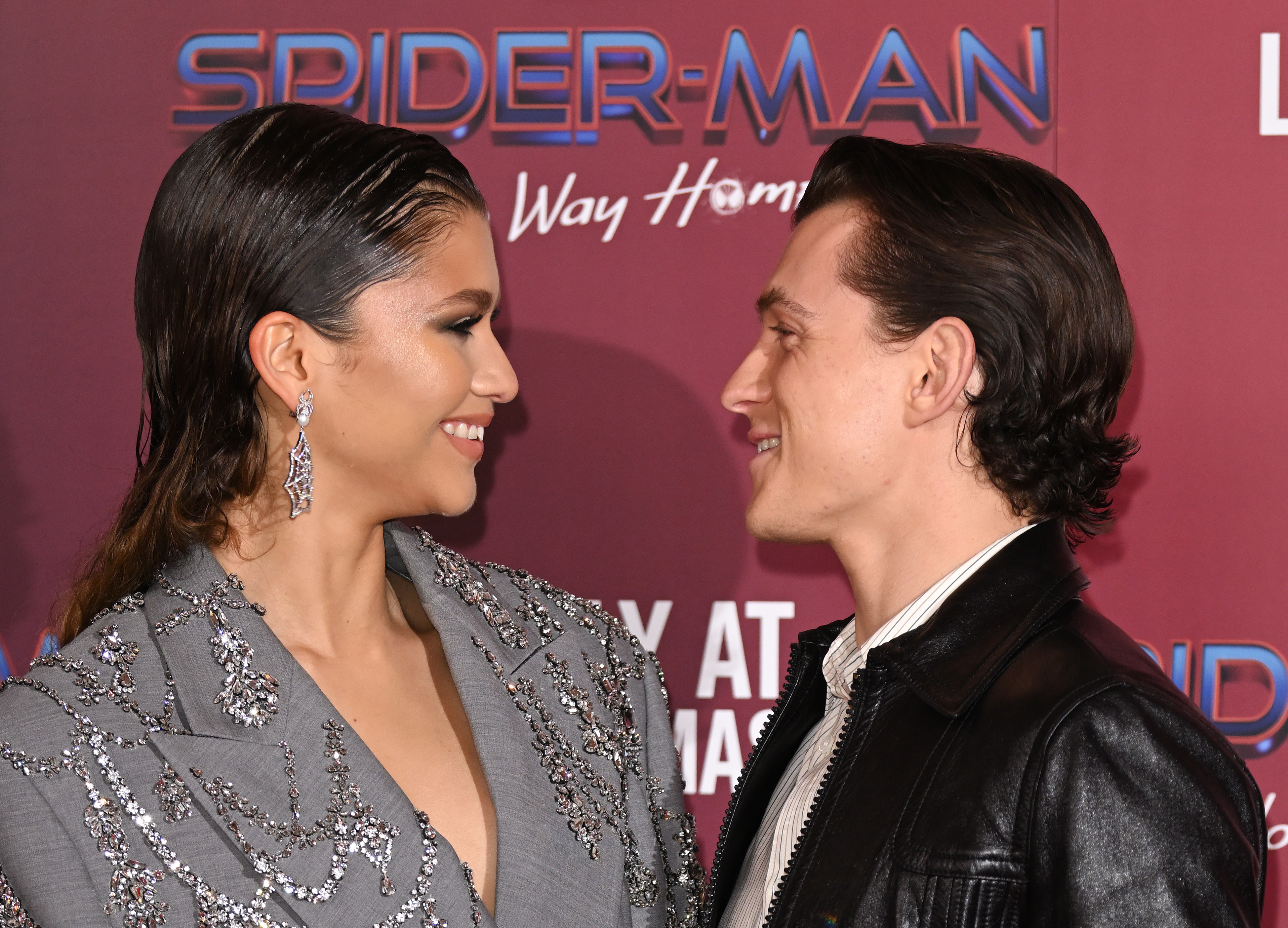 Zendaya and Tom Holland attend a photocall for "Spiderman: No Way Home" at The Old Sessions House on December 5, 2021, in London, England | Source: Getty Images