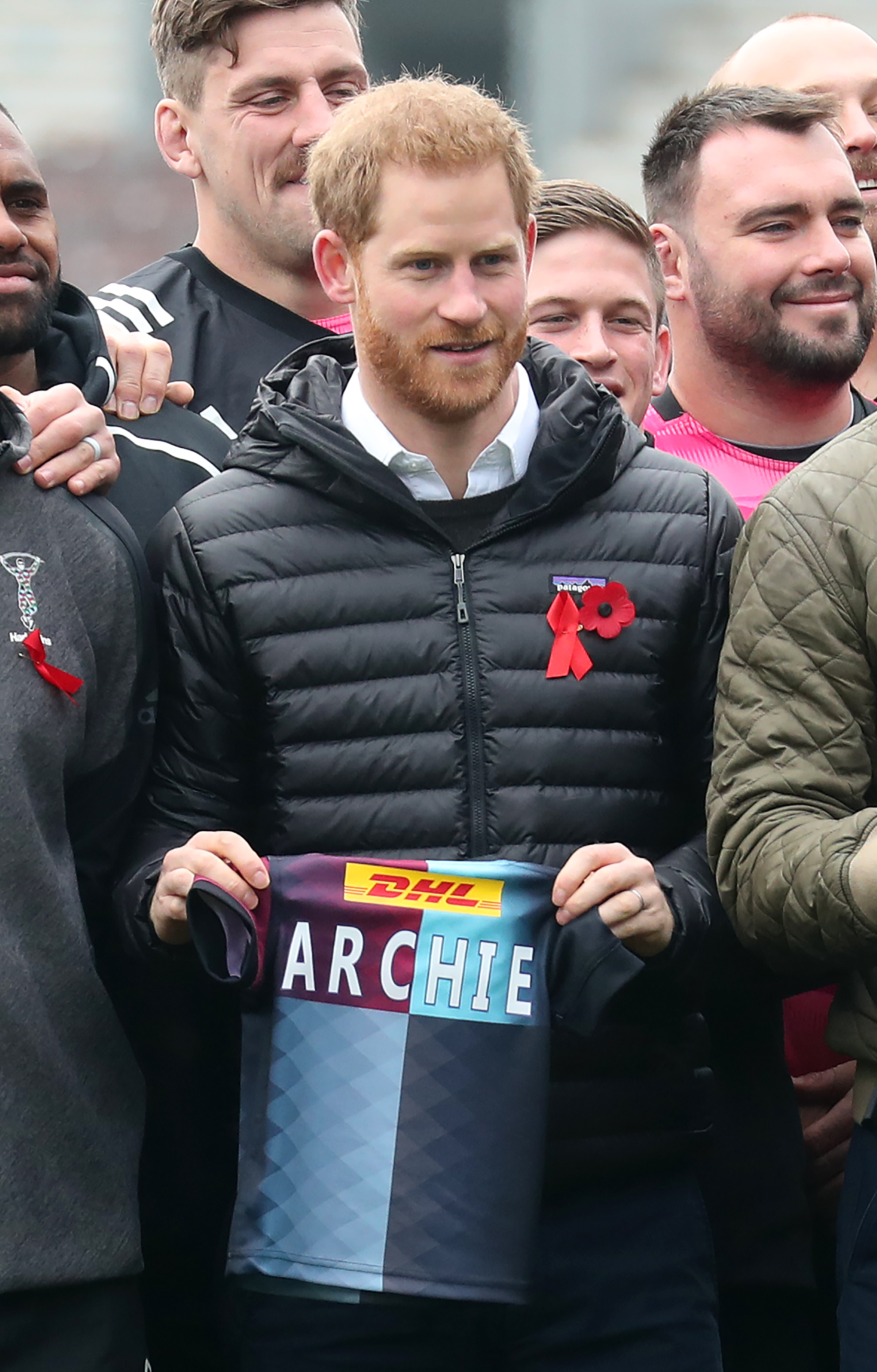 Prince Harry, Duke of Sussex, is presented with a Harlequins kit for son Archie during a Terrence Higgins Trust event at Twickenham Stoop in London, England, on November 8, 2019 | Source: Getty Images