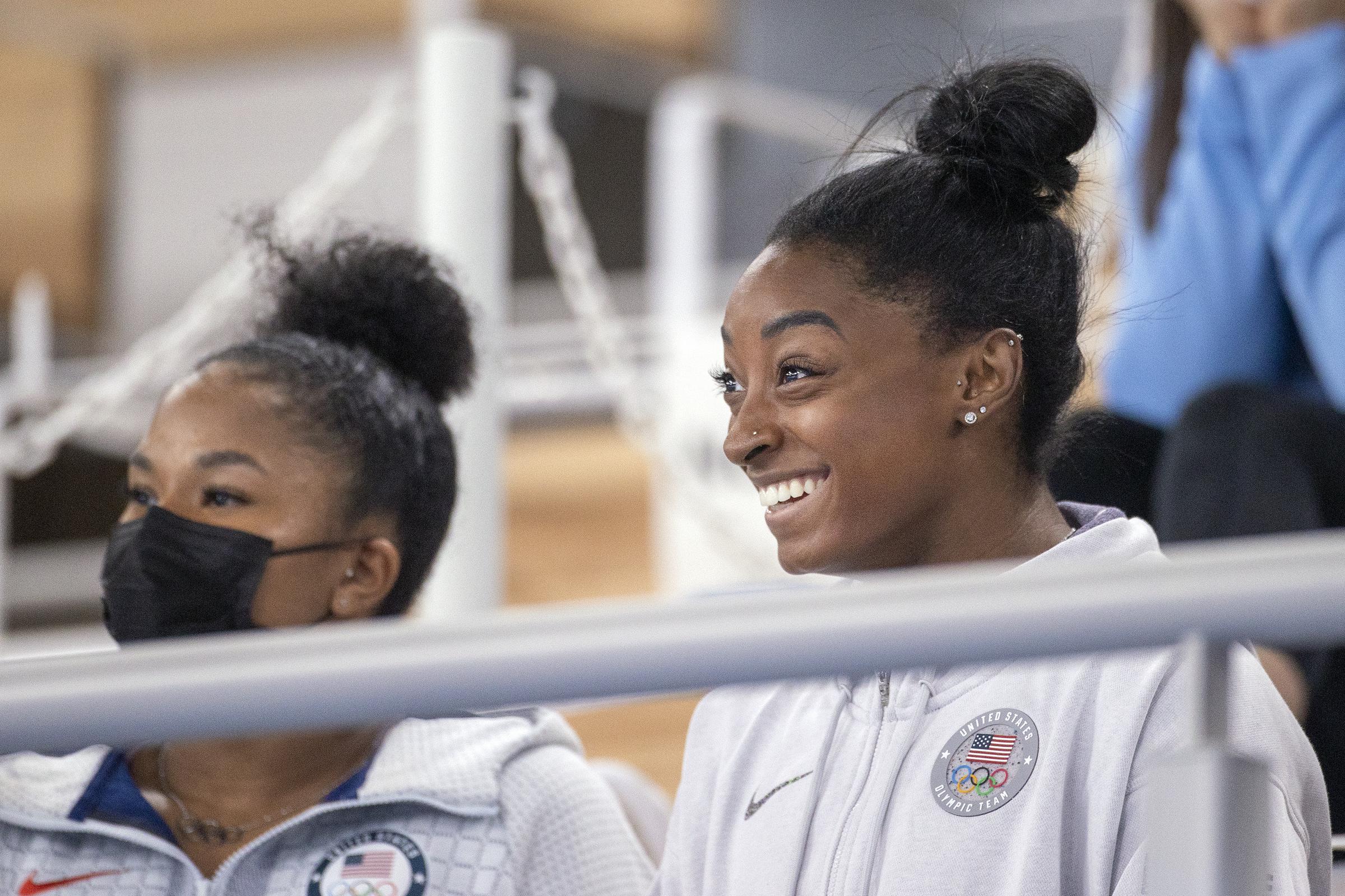 Simone Biles and teammate Jordan Chiles watching the All-Around Final for Women at Ariake Gymnastics Centre during the Tokyo 2020 Summer Olympic Games on July 29, 2021 in Tokyo, Japan | Source: Getty Images