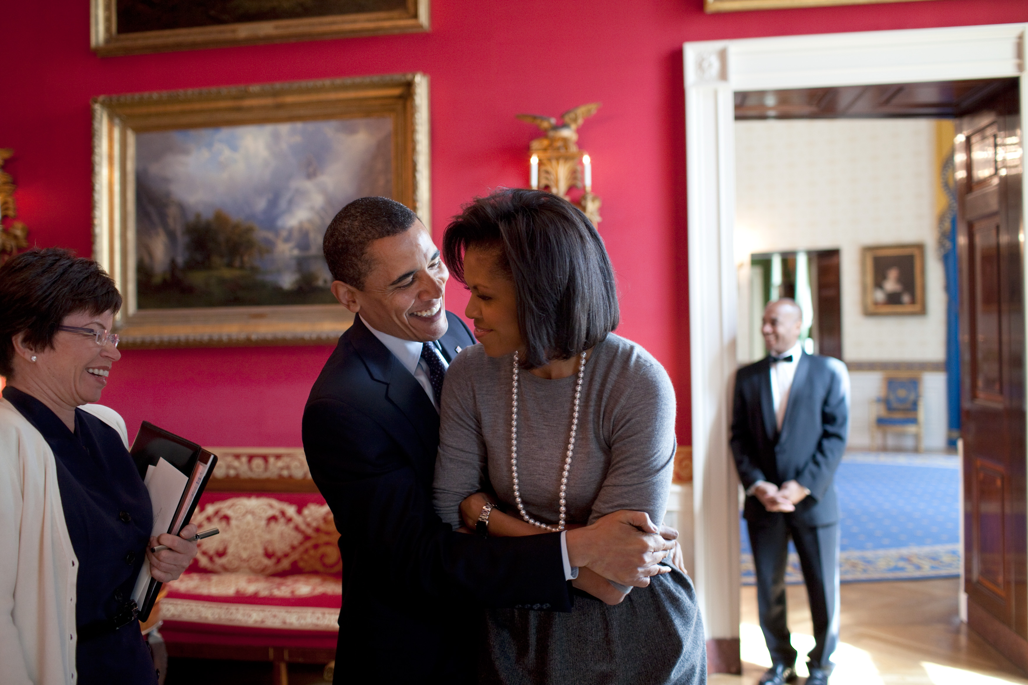 Barack Obama hugging Michelle Obama in the Red Room on March 20, 2009, in Washington, D.C. | Source: Getty Images