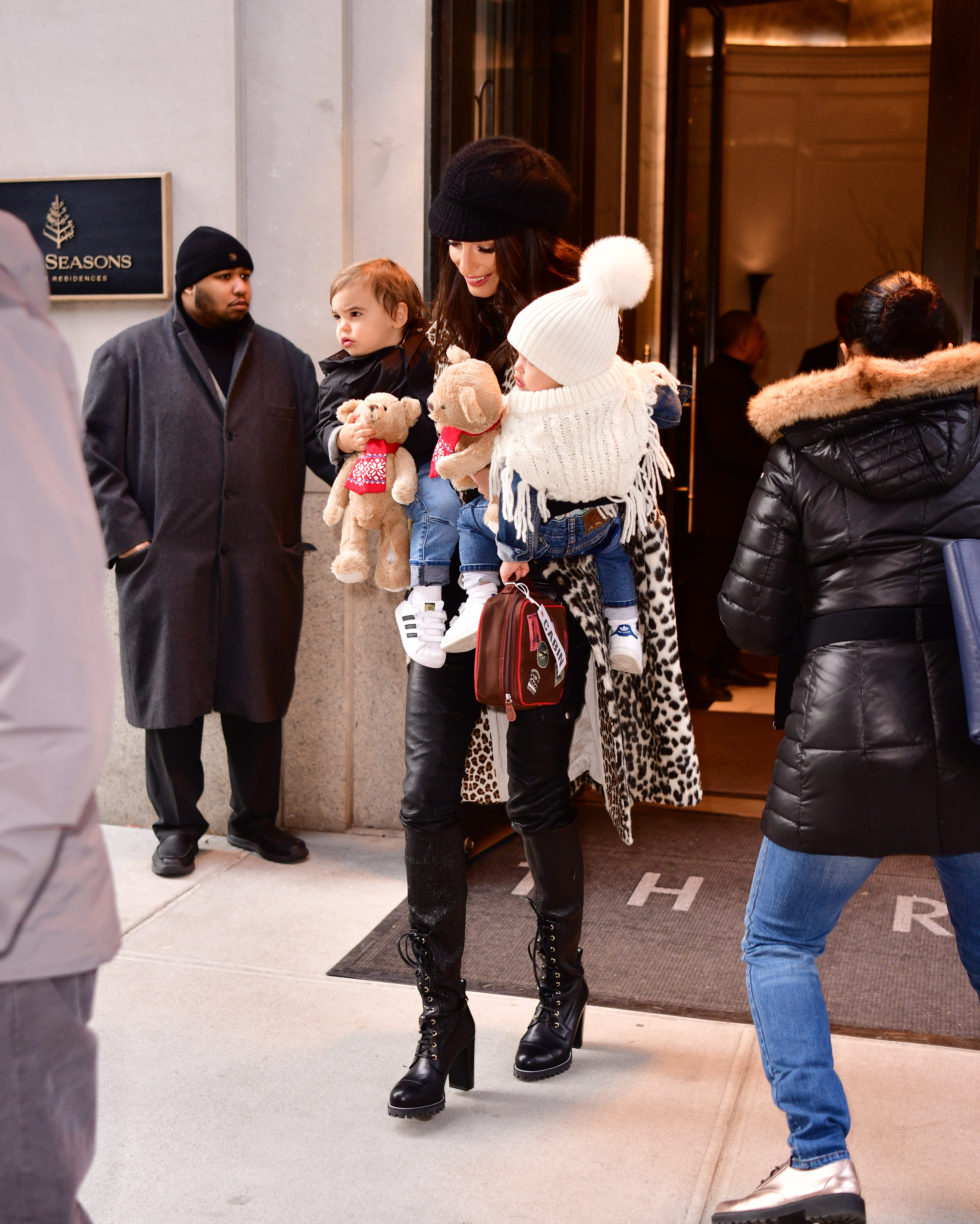 Amal Clooney seen with her and George Clooney's twins in New York City on December 6, 2018 | Source: Getty Images